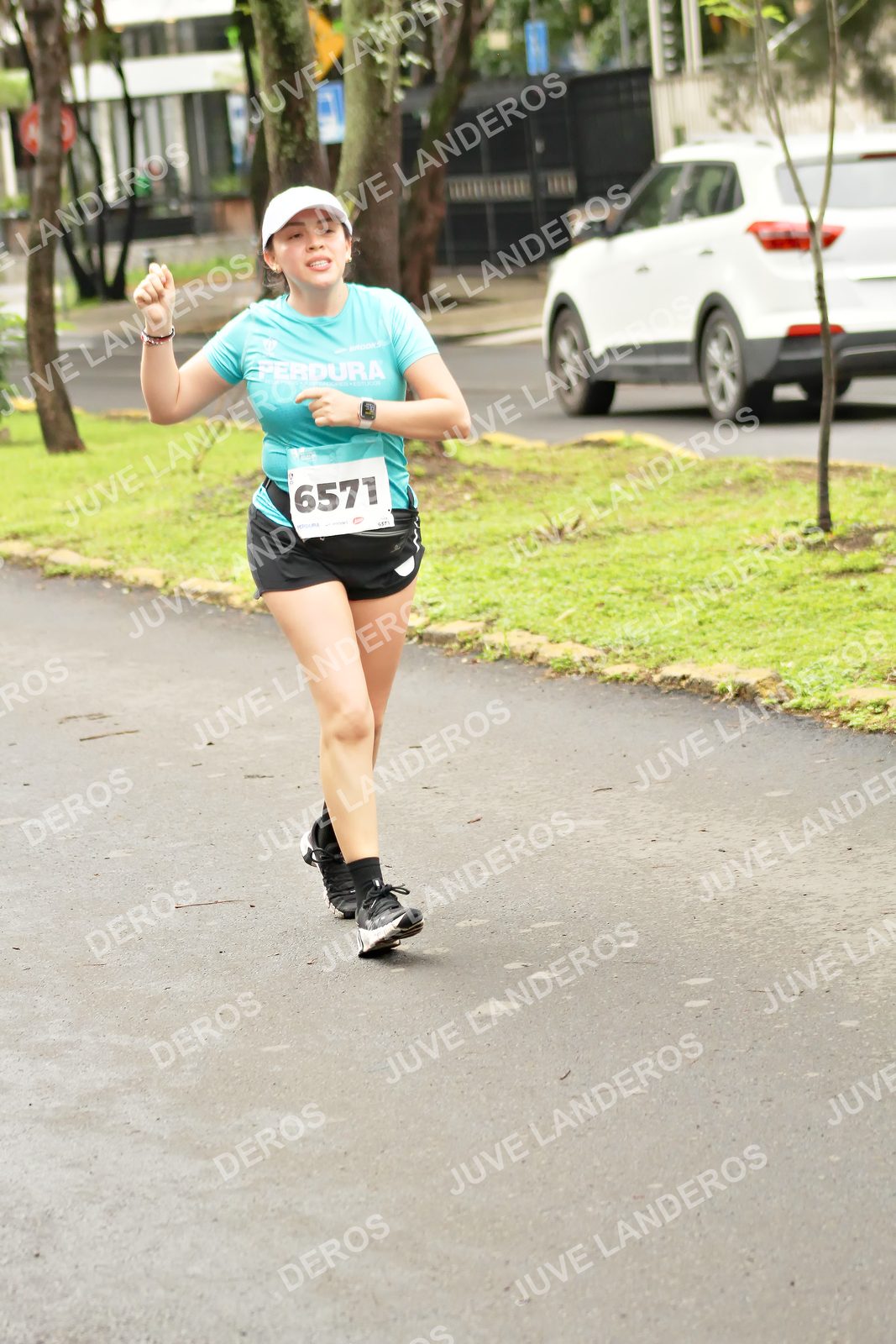 Foto del MEDIO MARATÓN ATLAS en Av. Patria, frente al Parque El Polvorín, Zapopan a las 09:03 · dorsal 6571