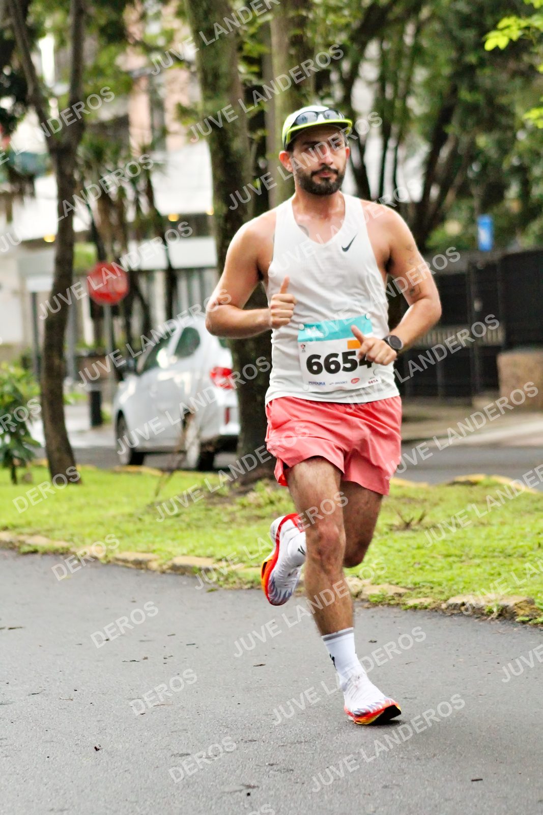 Foto del MEDIO MARATÓN ATLAS en Av. Patria, frente al Parque El Polvorín, Zapopan a las 08:01 · dorsal 6654