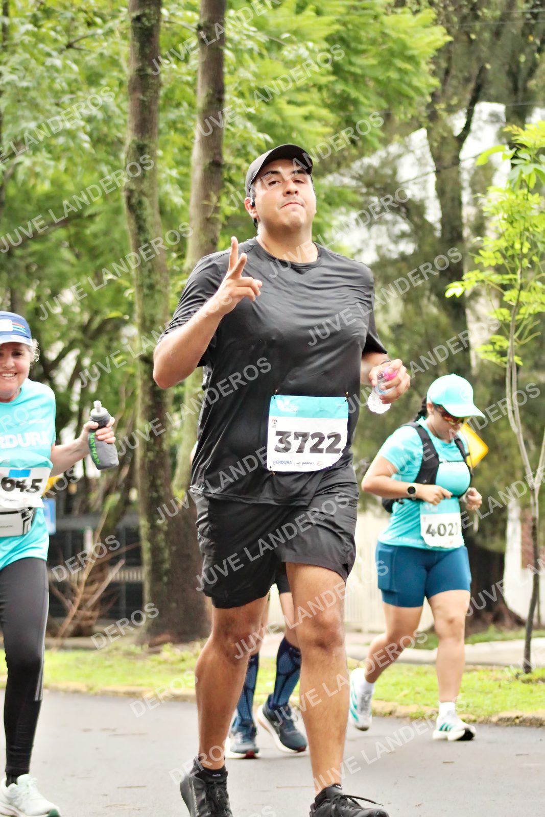 Foto del MEDIO MARATÓN ATLAS en Av. Patria, frente al Parque El Polvorín, Zapopan a las 08:46 · dorsal 3722, 645