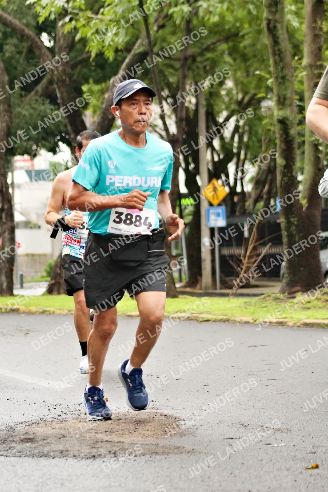 Foto del MEDIO MARATÓN ATLAS en Av. Patria, frente al Parque El Polvorín, Zapopan a las 08:27 · dorsal 3884, 3
