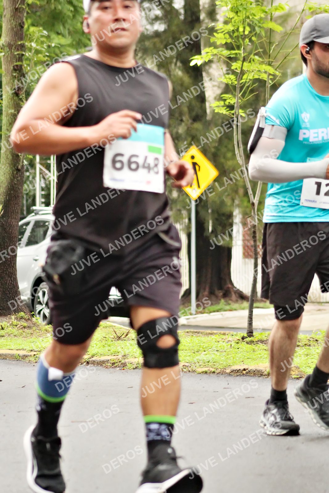 Foto del MEDIO MARATÓN ATLAS en Av. Patria, frente al Parque El Polvorín, Zapopan a las 08:41 · dorsal 6648