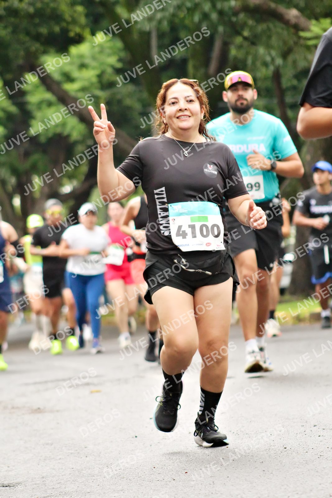 Foto del MEDIO MARATÓN ATLAS en Av. Patria, frente al Parque El Polvorín, Zapopan a las 08:36 · dorsal 4100, 99
