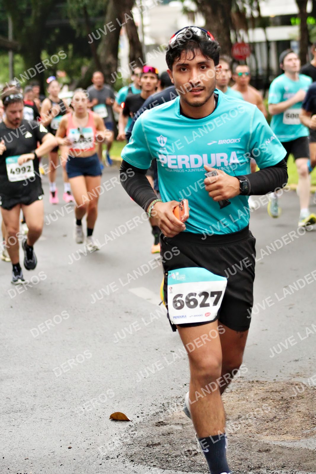 Foto del MEDIO MARATÓN ATLAS en Av. Patria, frente al Parque El Polvorín, Zapopan a las 08:21 · dorsal 6627, 4992
