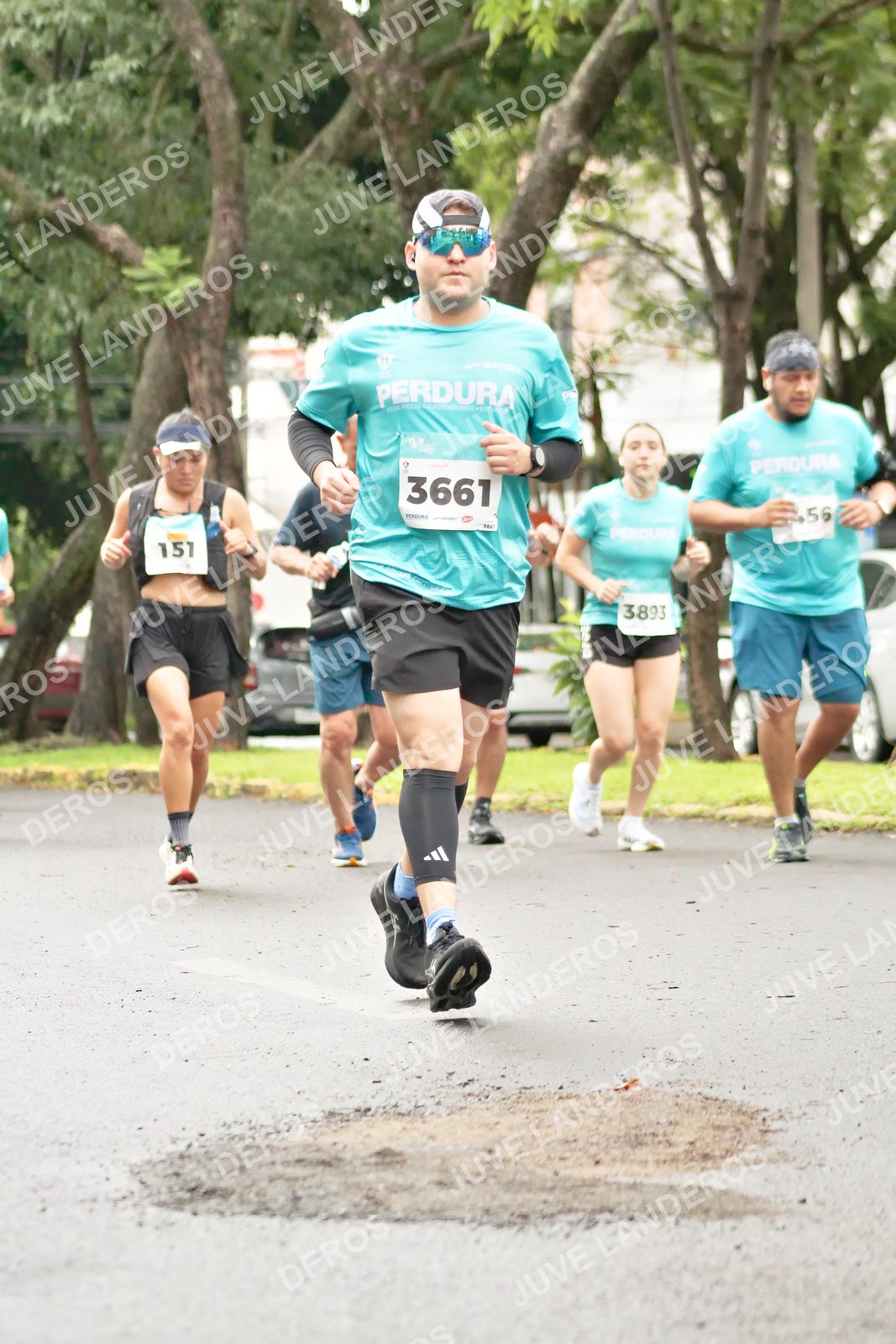 Foto del MEDIO MARATÓN ATLAS en Av. Patria, frente al Parque El Polvorín, Zapopan a las 08:43 · dorsal 3661, 3893, 151, 456