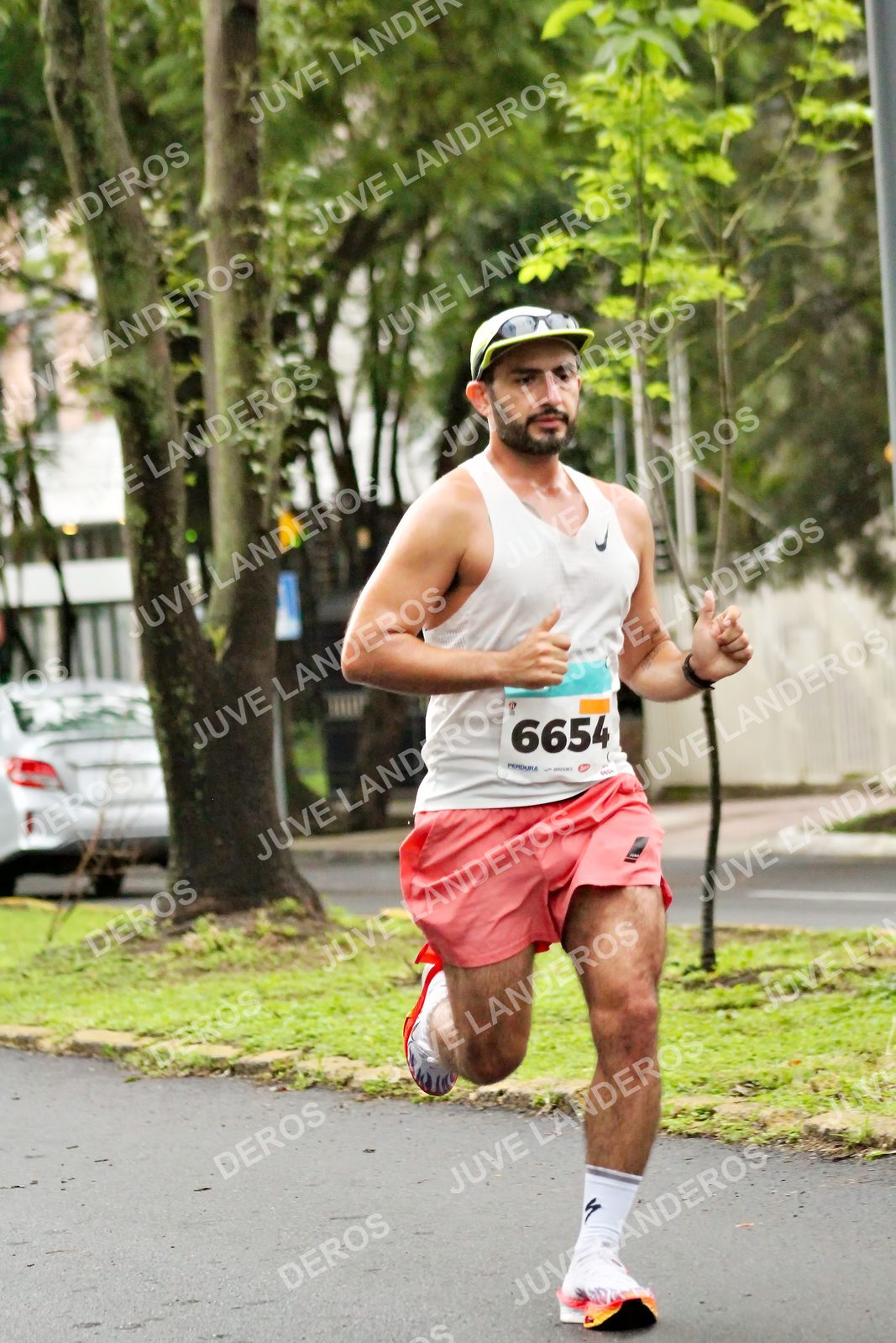 Foto del MEDIO MARATÓN ATLAS en Av. Patria, frente al Parque El Polvorín, Zapopan a las 08:01 · dorsal 6654