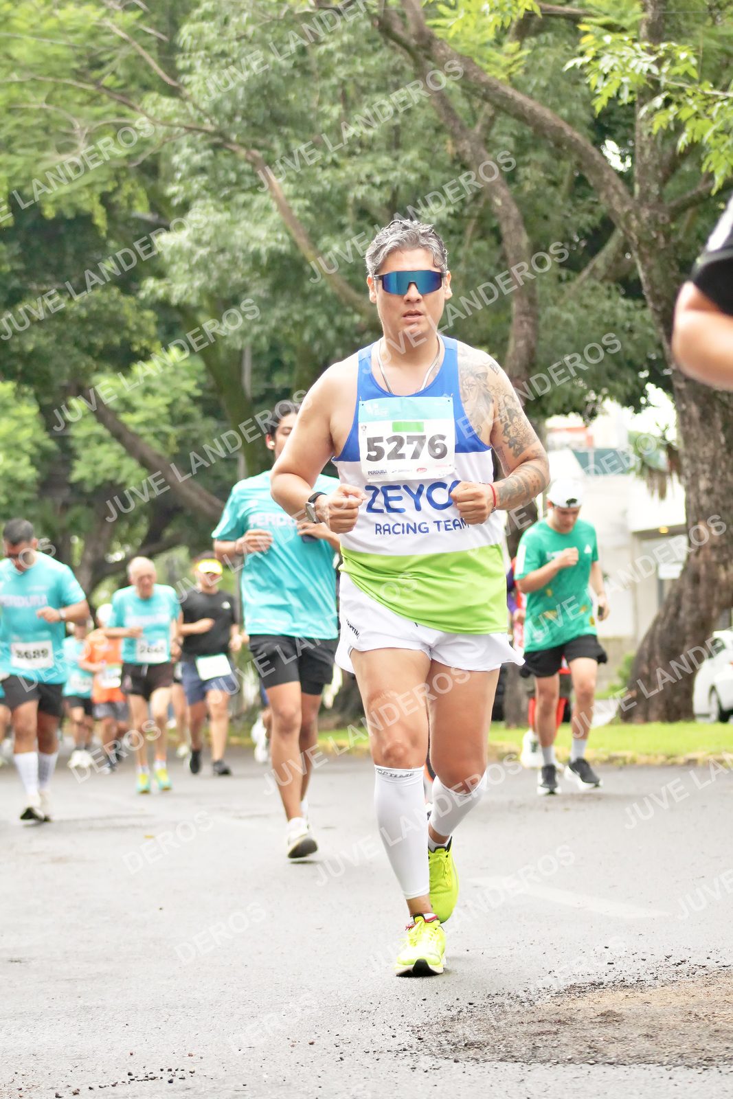 Foto del MEDIO MARATÓN ATLAS en Av. Patria, frente al Parque El Polvorín, Zapopan a las 08:44 · dorsal 5276, 3689