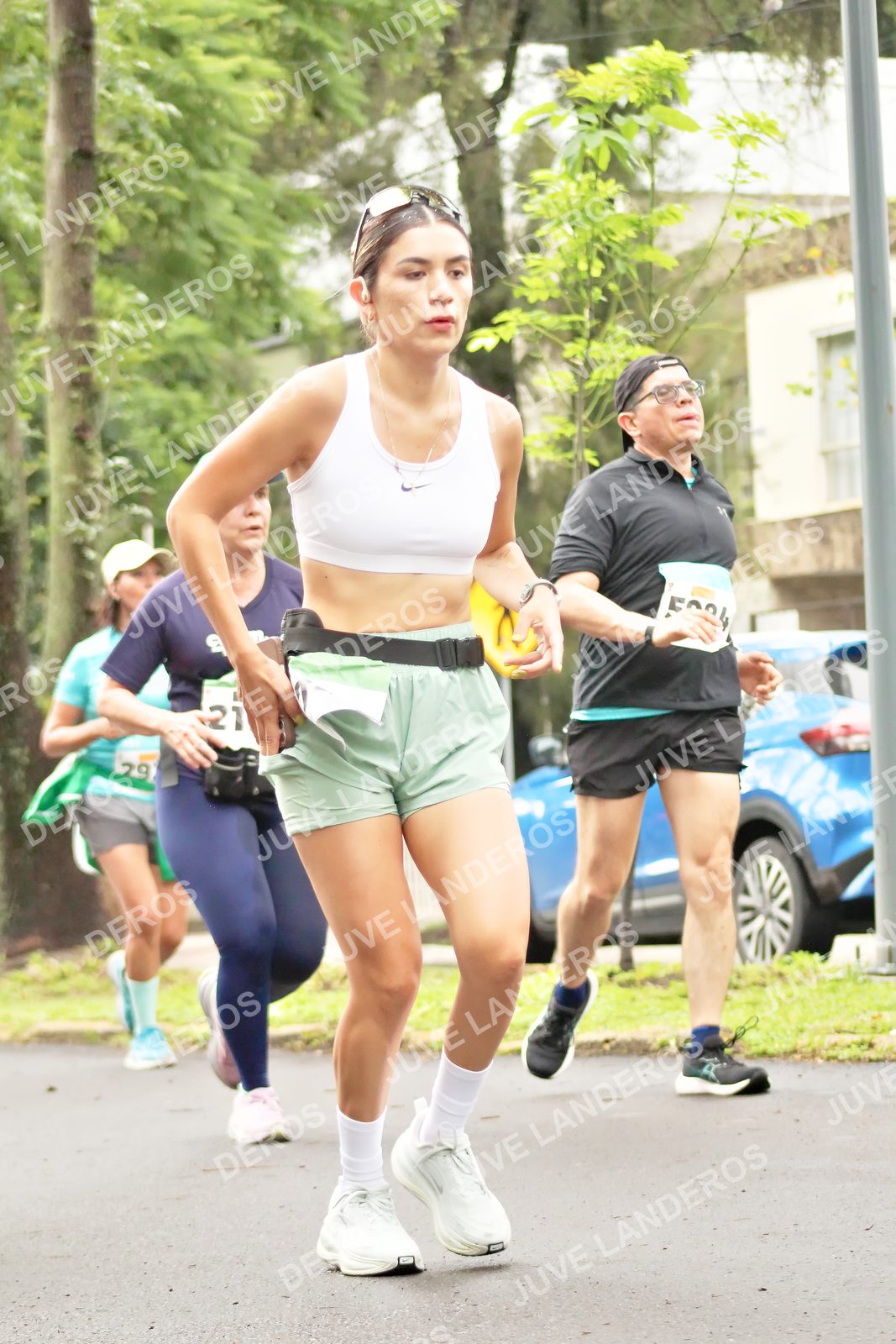 Foto del MEDIO MARATÓN ATLAS en Av. Patria, frente al Parque El Polvorín, Zapopan a las 08:45 · dorsal 21, 29