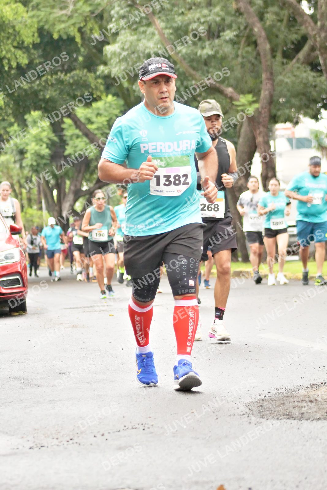 Foto del MEDIO MARATÓN ATLAS en Av. Patria, frente al Parque El Polvorín, Zapopan a las 08:43 · dorsal 268, 1382, 190, 1893