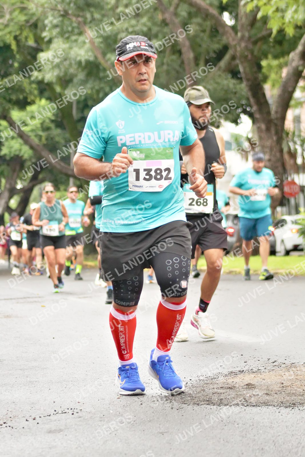 Foto del MEDIO MARATÓN ATLAS en Av. Patria, frente al Parque El Polvorín, Zapopan a las 08:43 · dorsal 268, 1382, 100