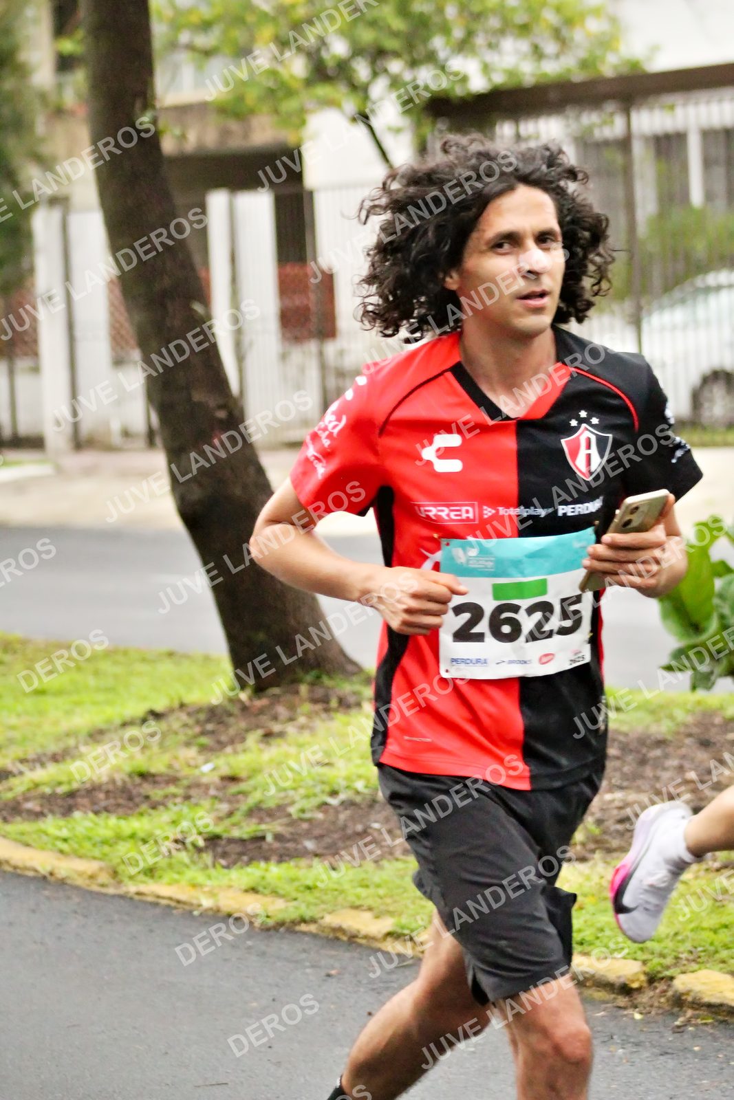 Foto del MEDIO MARATÓN ATLAS en Av. Patria, frente al Parque El Polvorín, Zapopan a las 08:03 · dorsal 2625