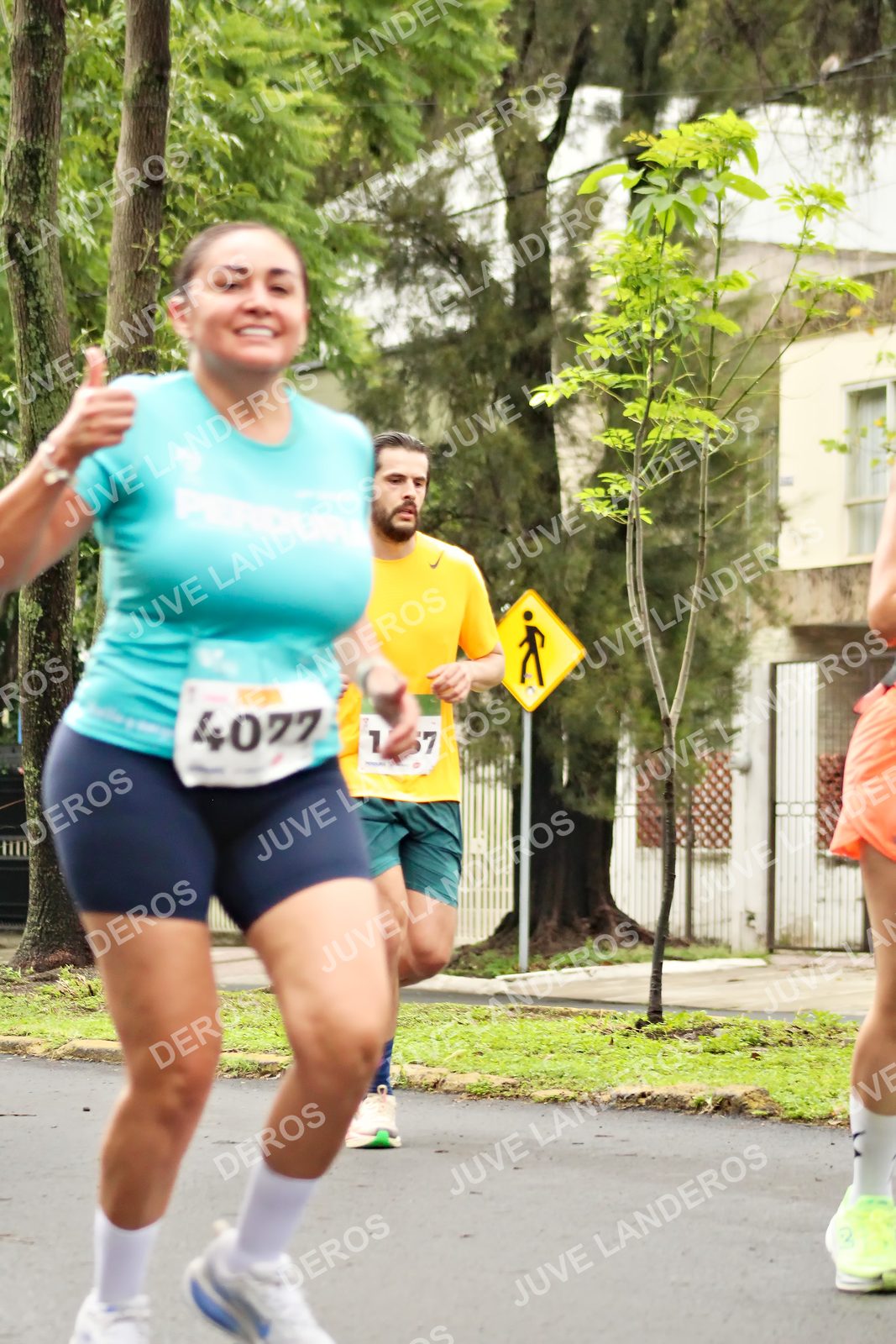 Foto del MEDIO MARATÓN ATLAS en Av. Patria, frente al Parque El Polvorín, Zapopan a las 08:39 · dorsal 4077, 1, 67