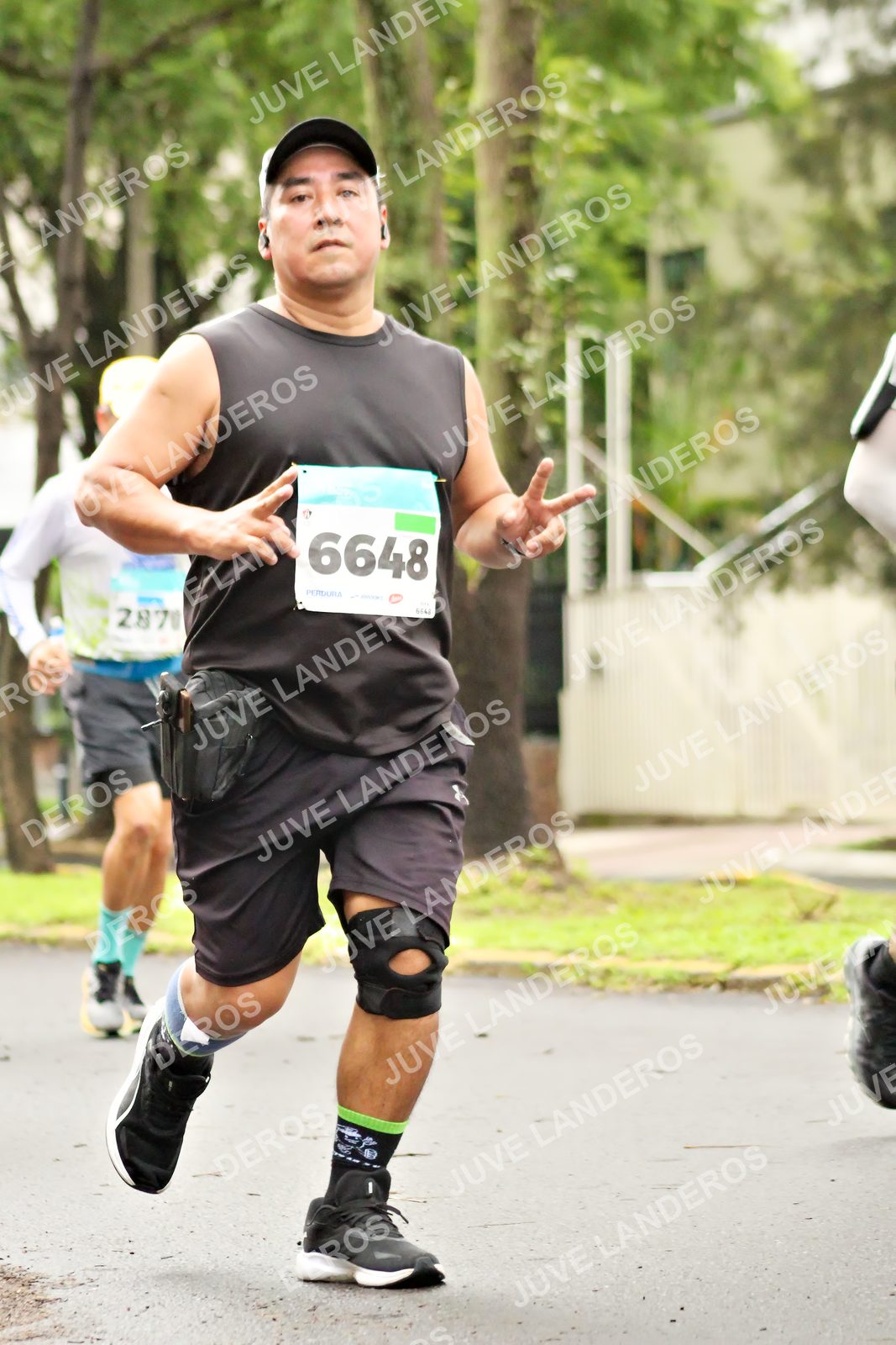 Foto del MEDIO MARATÓN ATLAS en Av. Patria, frente al Parque El Polvorín, Zapopan a las 08:41 · dorsal 6648