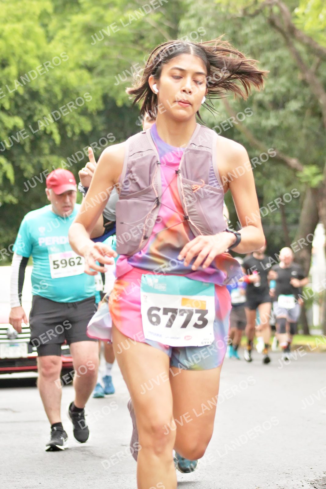 Foto del MEDIO MARATÓN ATLAS en Av. Patria, frente al Parque El Polvorín, Zapopan a las 08:42 · dorsal 6773, 5962