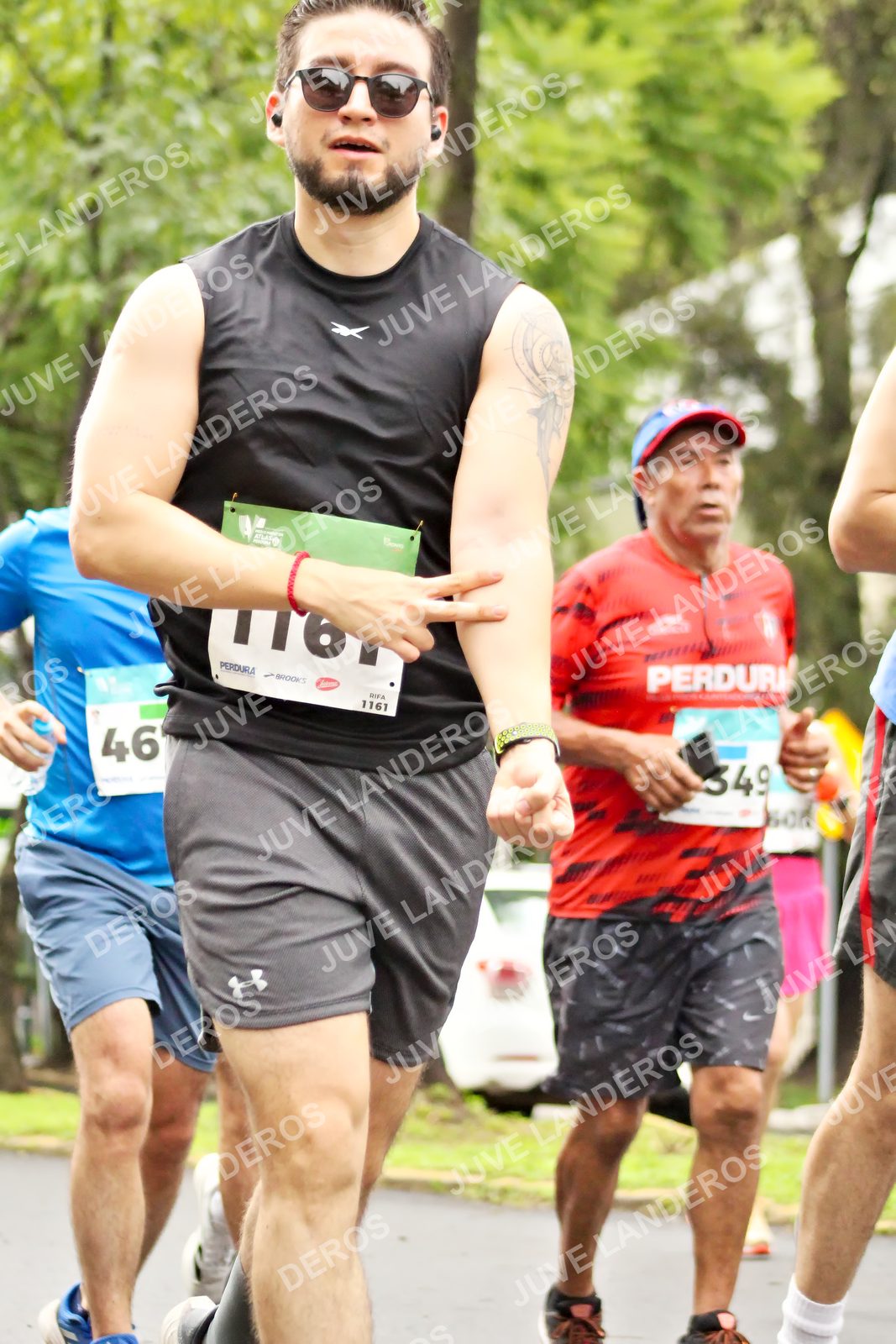 Foto del MEDIO MARATÓN ATLAS en Av. Patria, frente al Parque El Polvorín, Zapopan a las 08:38 · dorsal 46, 1161, 349