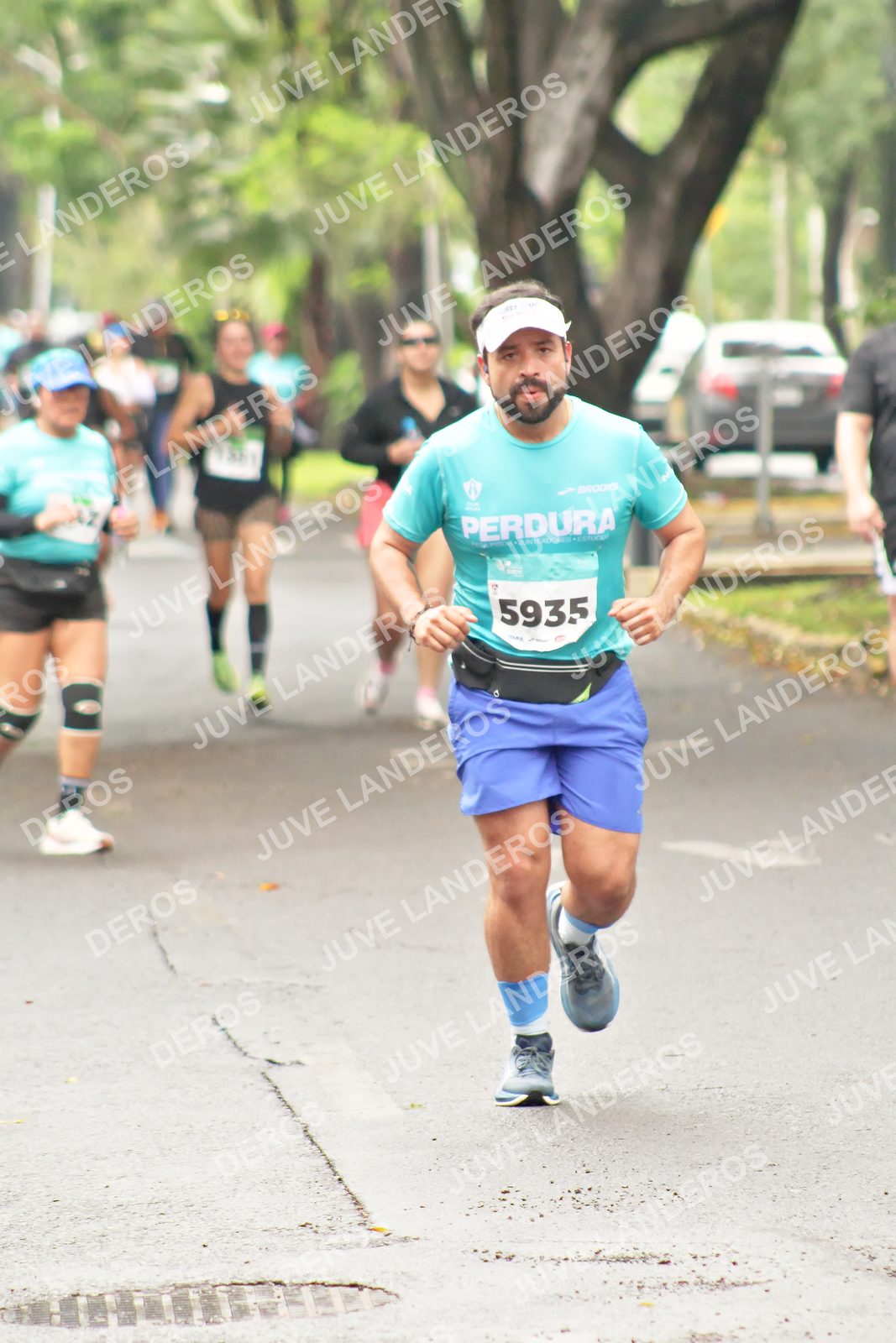 Foto del MEDIO MARATÓN ATLAS en Av. Patria, frente al Parque El Polvorín, Zapopan a las 08:55 · dorsal 5935