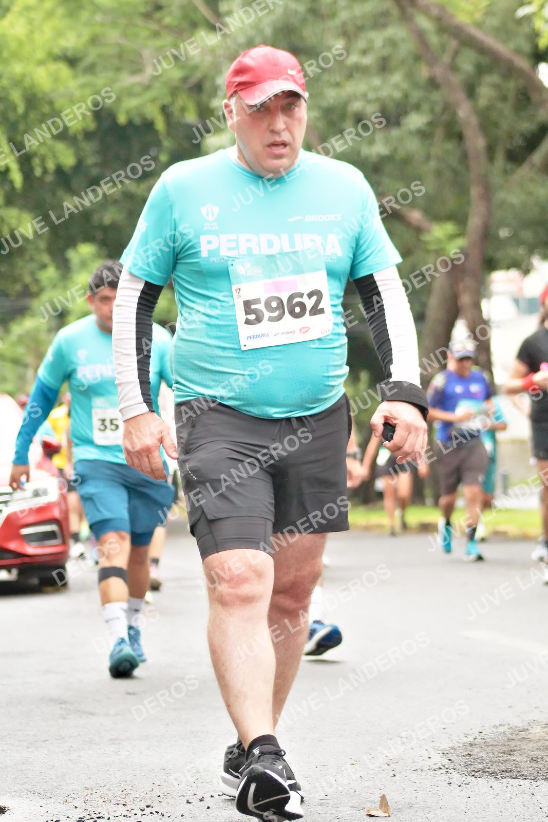 Foto del MEDIO MARATÓN ATLAS en Av. Patria, frente al Parque El Polvorín, Zapopan a las 08:42 · dorsal 35, 5962