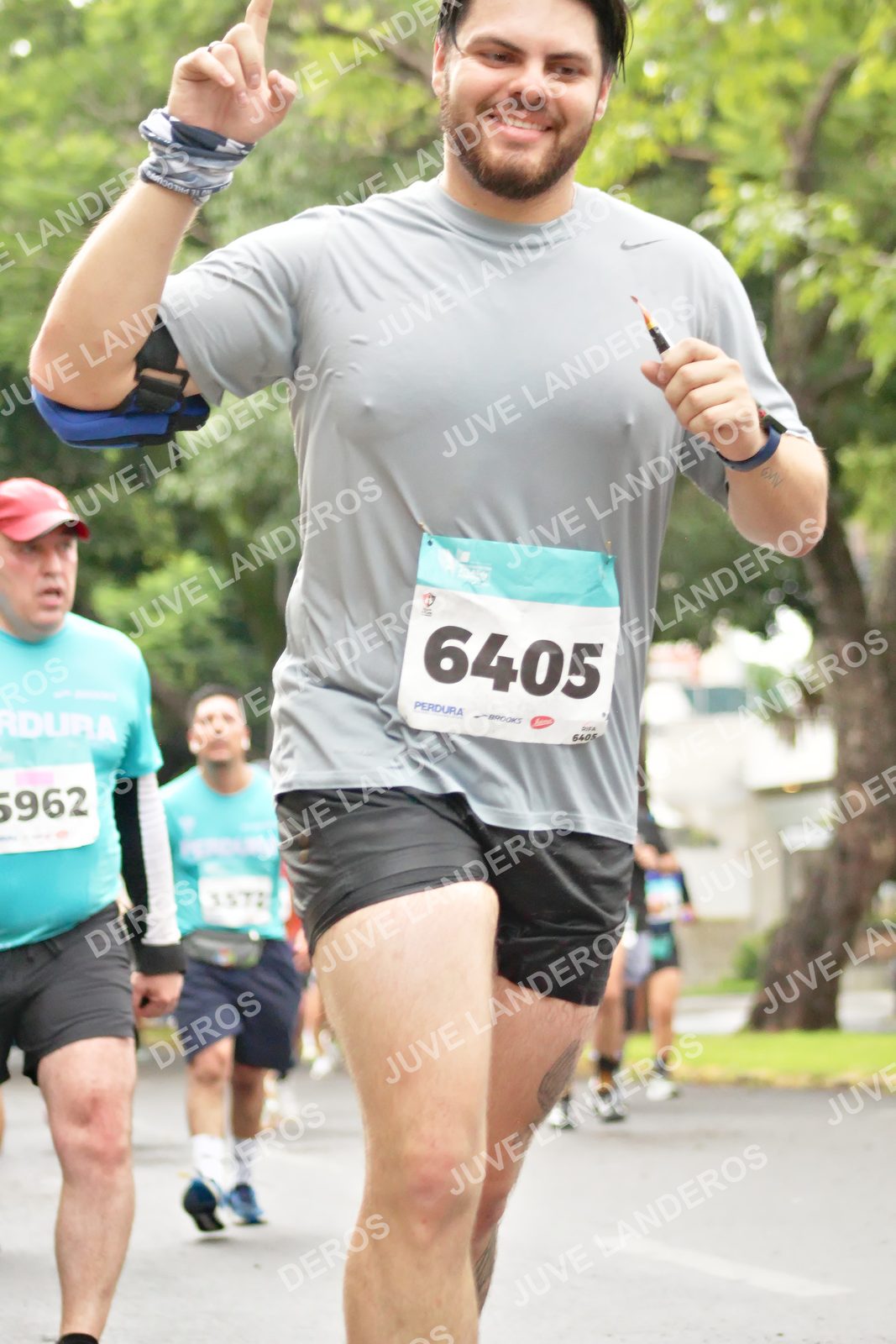 Foto del MEDIO MARATÓN ATLAS en Av. Patria, frente al Parque El Polvorín, Zapopan a las 08:42 · dorsal 6405, 5962