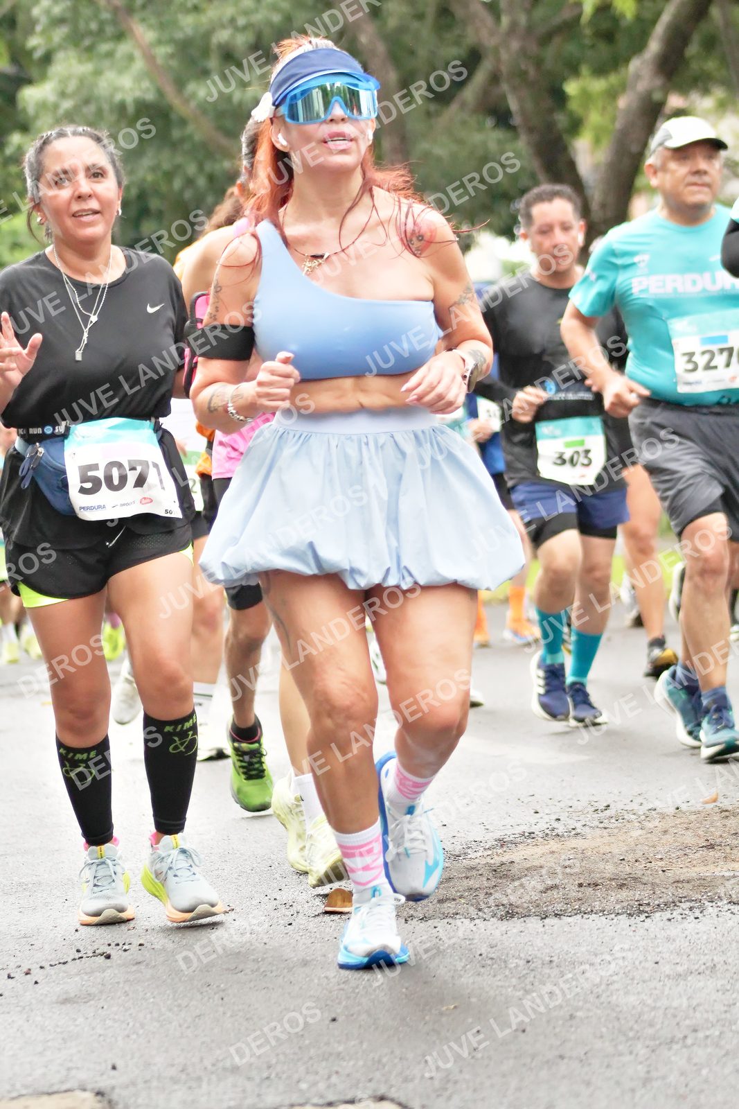 Foto del MEDIO MARATÓN ATLAS en Av. Patria, frente al Parque El Polvorín, Zapopan a las 08:36 · dorsal 327, 303, 5071