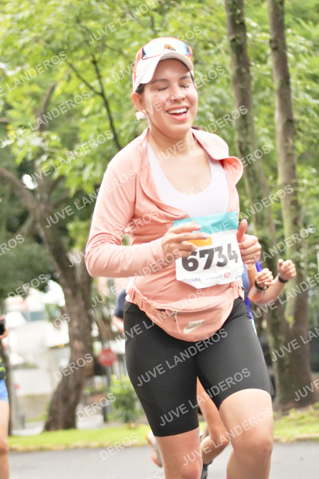 Foto del MEDIO MARATÓN ATLAS en Av. Patria, frente al Parque El Polvorín, Zapopan a las 08:38 · dorsal 6734, 673