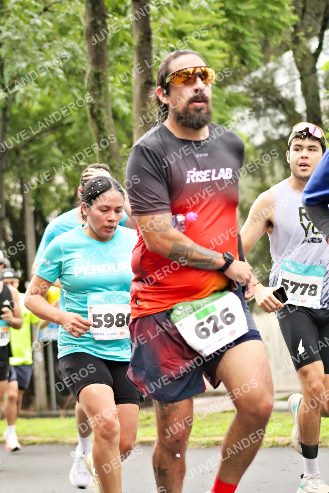 Foto del MEDIO MARATÓN ATLAS en Av. Patria, frente al Parque El Polvorín, Zapopan a las 08:22 · dorsal 626, 5778, 5980
