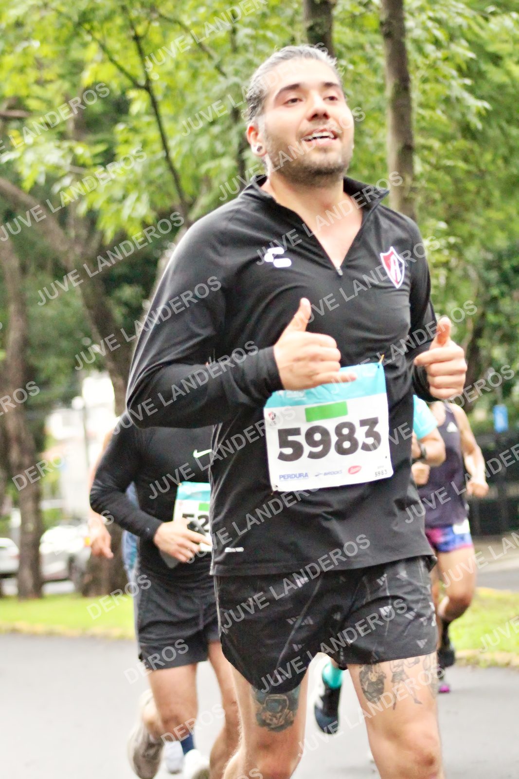 Foto del MEDIO MARATÓN ATLAS en Av. Patria, frente al Parque El Polvorín, Zapopan a las 08:13 · dorsal 5983, 2