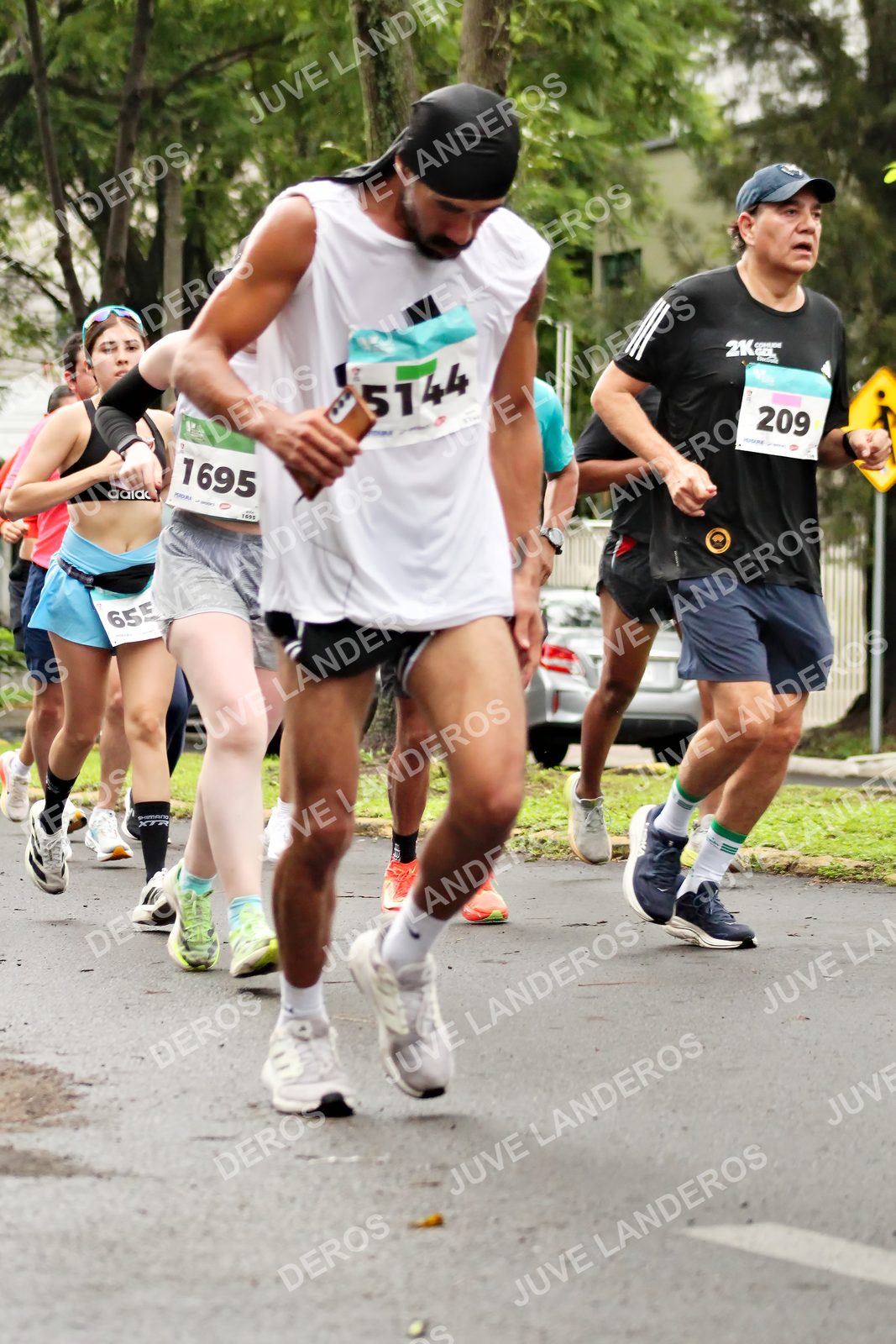 Foto del MEDIO MARATÓN ATLAS en Av. Patria, frente al Parque El Polvorín, Zapopan a las 08:30 · dorsal 209, 1695, 5144, 655