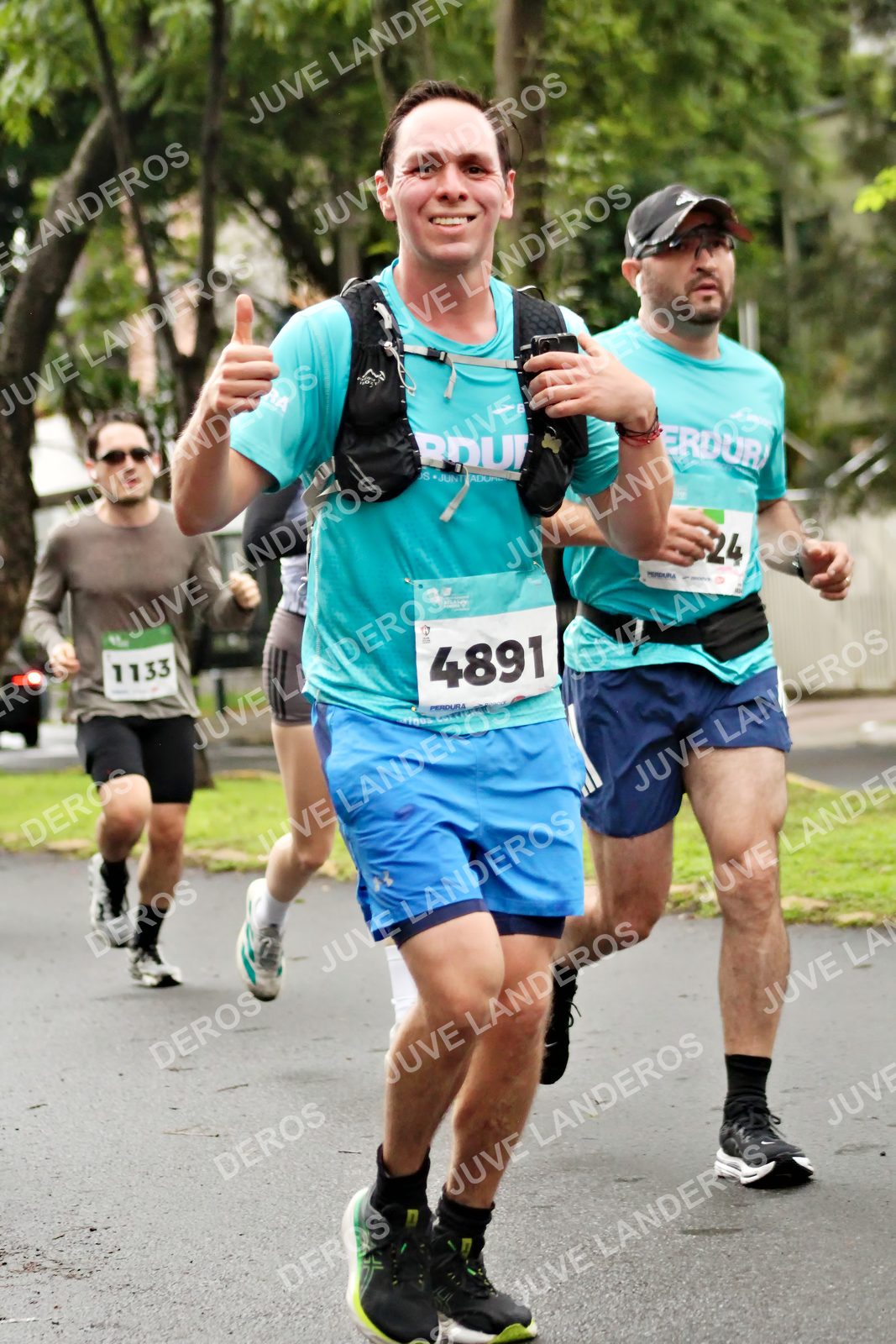 Foto del MEDIO MARATÓN ATLAS en Av. Patria, frente al Parque El Polvorín, Zapopan a las 08:15 · dorsal 4891, 1133, 24