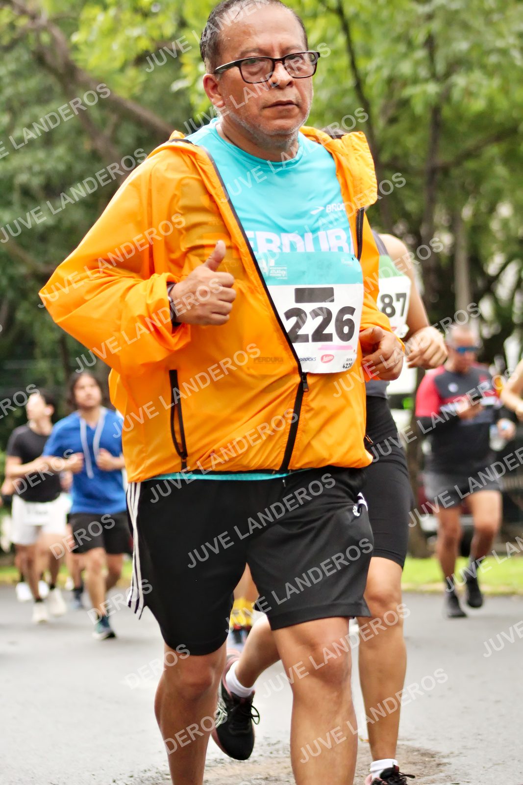 Foto del MEDIO MARATÓN ATLAS en Av. Patria, frente al Parque El Polvorín, Zapopan a las 08:38 · dorsal 226, 87