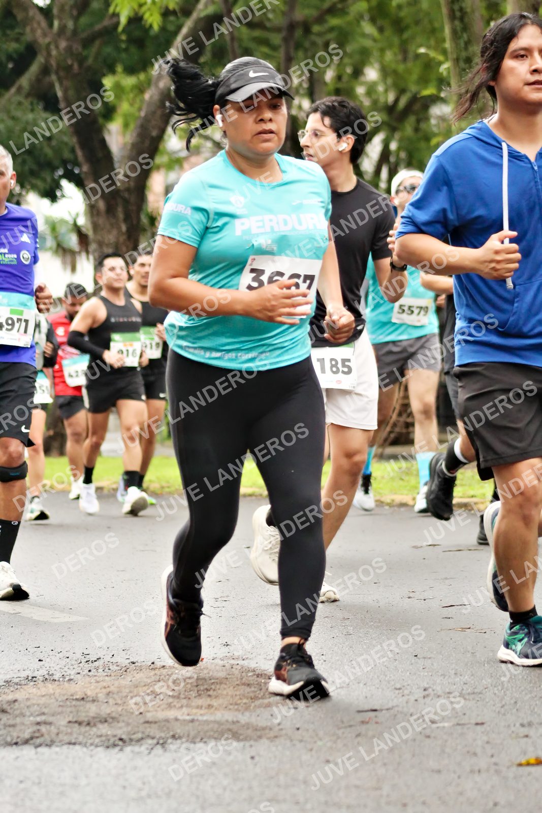 Foto del MEDIO MARATÓN ATLAS en Av. Patria, frente al Parque El Polvorín, Zapopan a las 08:38 · dorsal 5579, 185, 971, 919