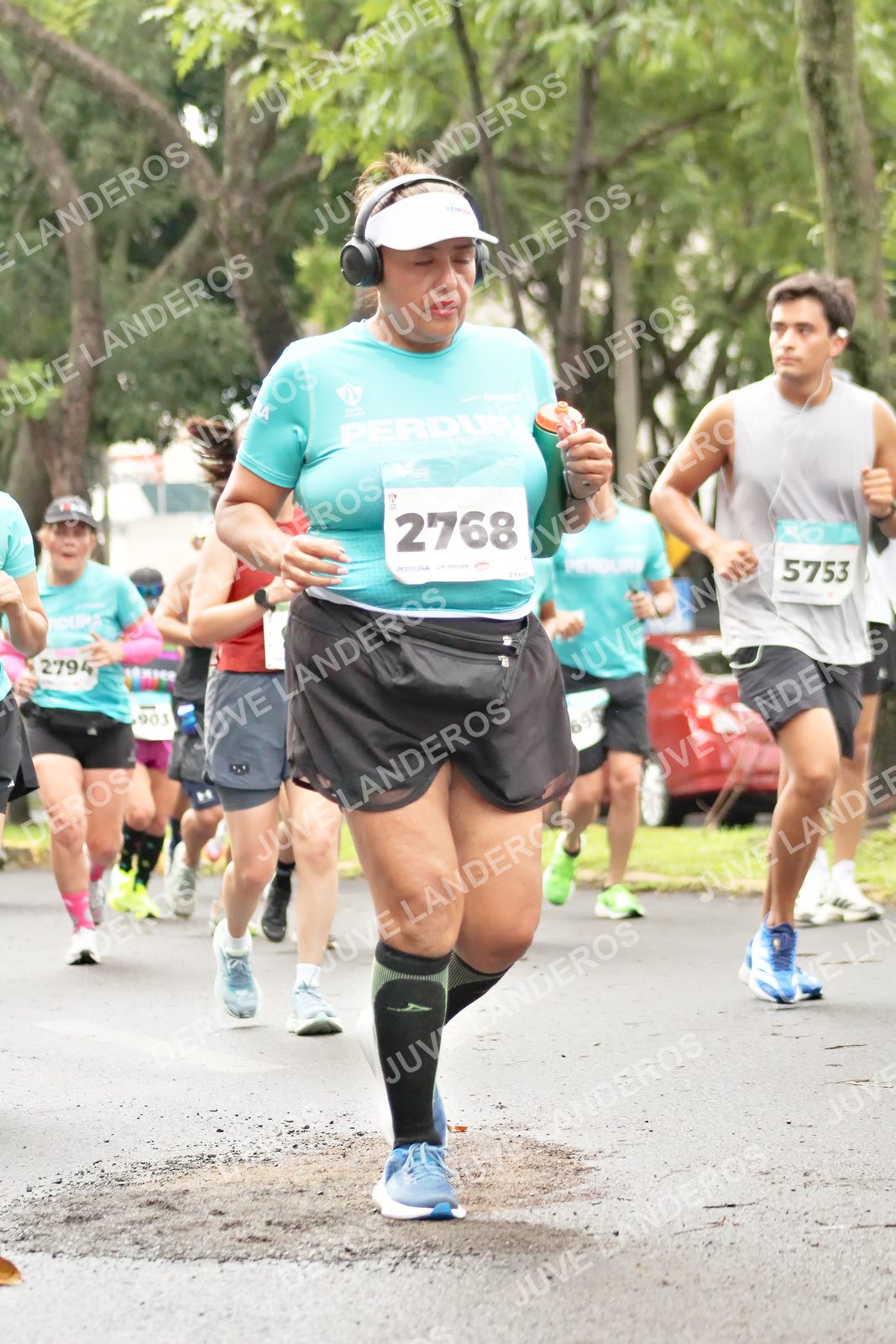 Foto del MEDIO MARATÓN ATLAS en Av. Patria, frente al Parque El Polvorín, Zapopan a las 08:38 · dorsal 2768, 5753, 903, 2794