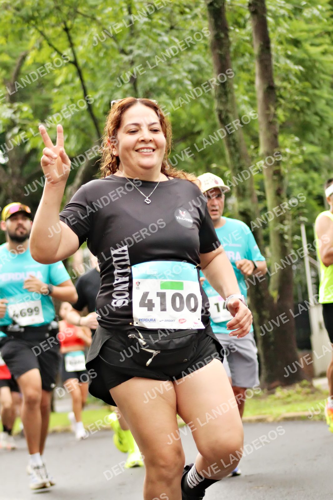 Foto del MEDIO MARATÓN ATLAS en Av. Patria, frente al Parque El Polvorín, Zapopan a las 08:36 · dorsal 4100, 4699, 14