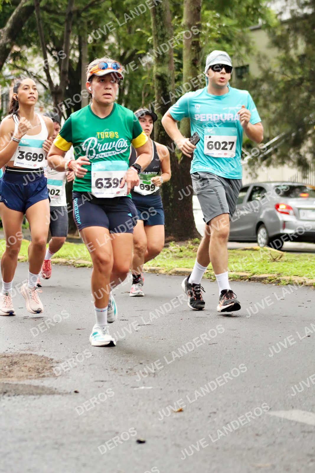 Foto del MEDIO MARATÓN ATLAS en Av. Patria, frente al Parque El Polvorín, Zapopan a las 08:24 · dorsal 6027, 639, 3699, 699