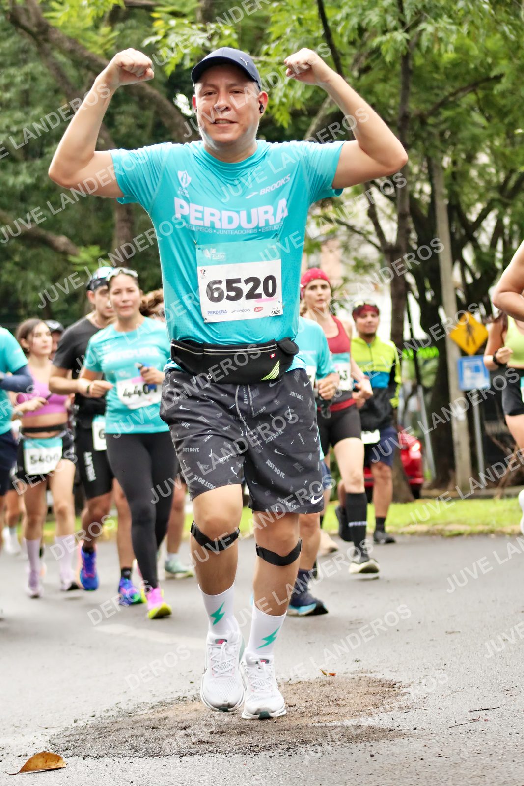 Foto del MEDIO MARATÓN ATLAS en Av. Patria, frente al Parque El Polvorín, Zapopan a las 08:38 · dorsal 6520, 5400, 2, 6