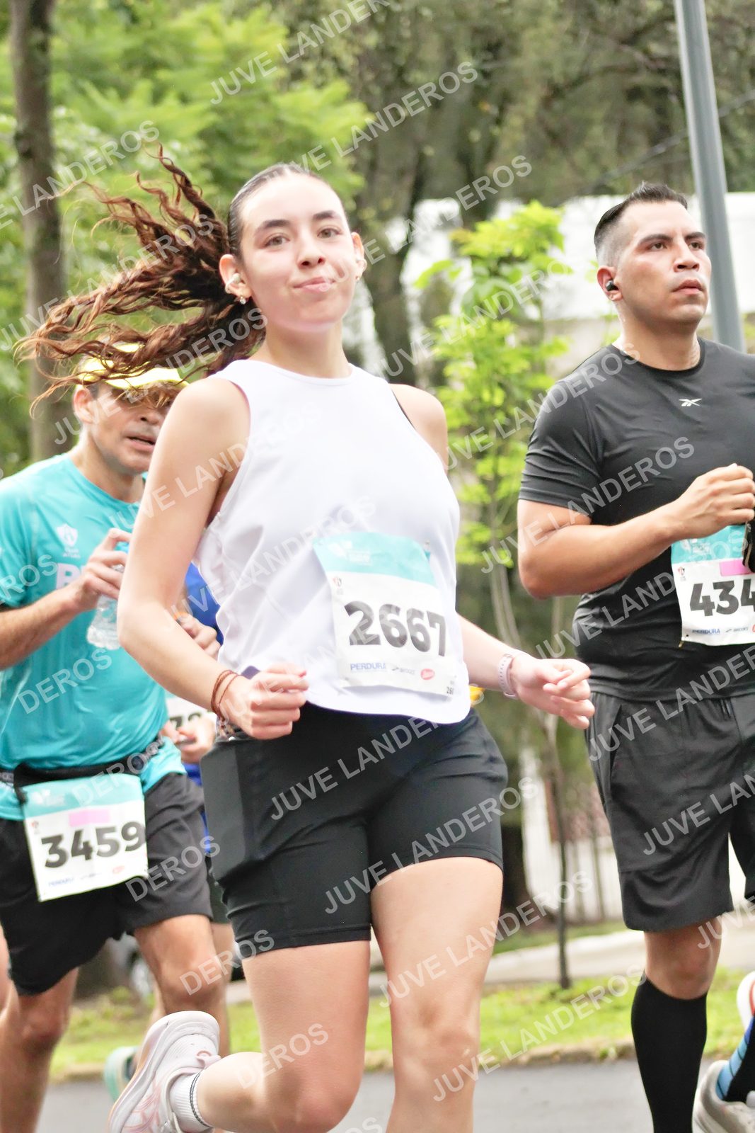 Foto del MEDIO MARATÓN ATLAS en Av. Patria, frente al Parque El Polvorín, Zapopan a las 08:27 · dorsal 2667, 3459, 434