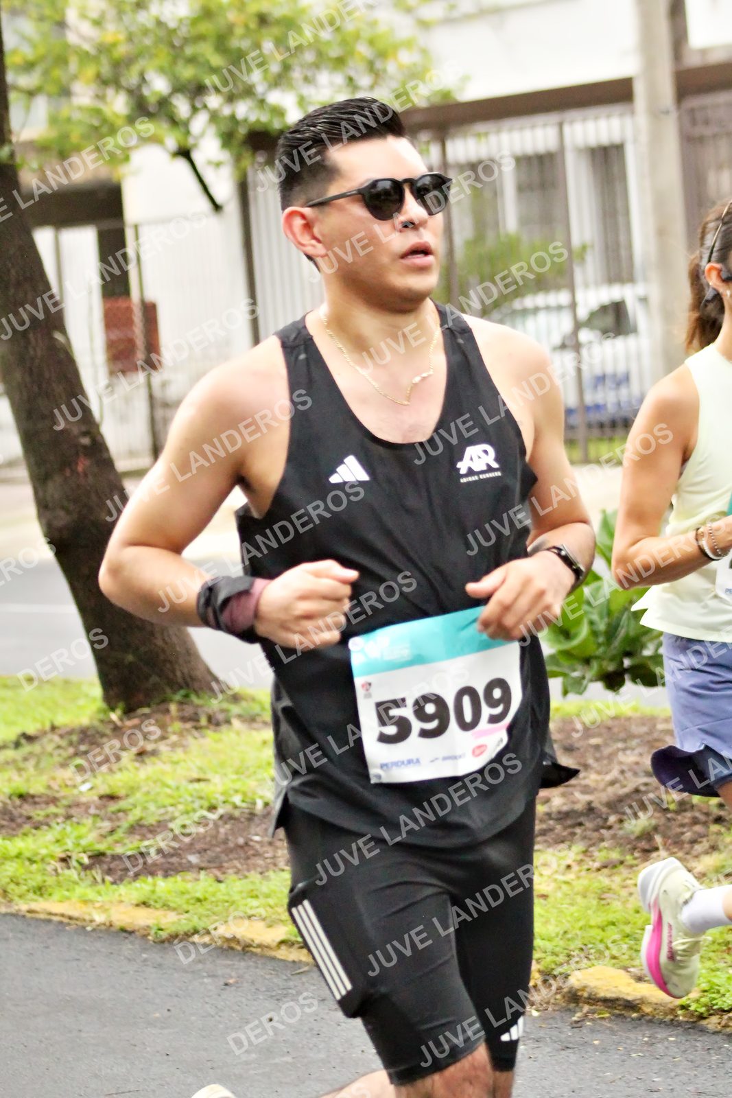 Foto del MEDIO MARATÓN ATLAS en Av. Patria, frente al Parque El Polvorín, Zapopan a las 08:09 · dorsal 5909