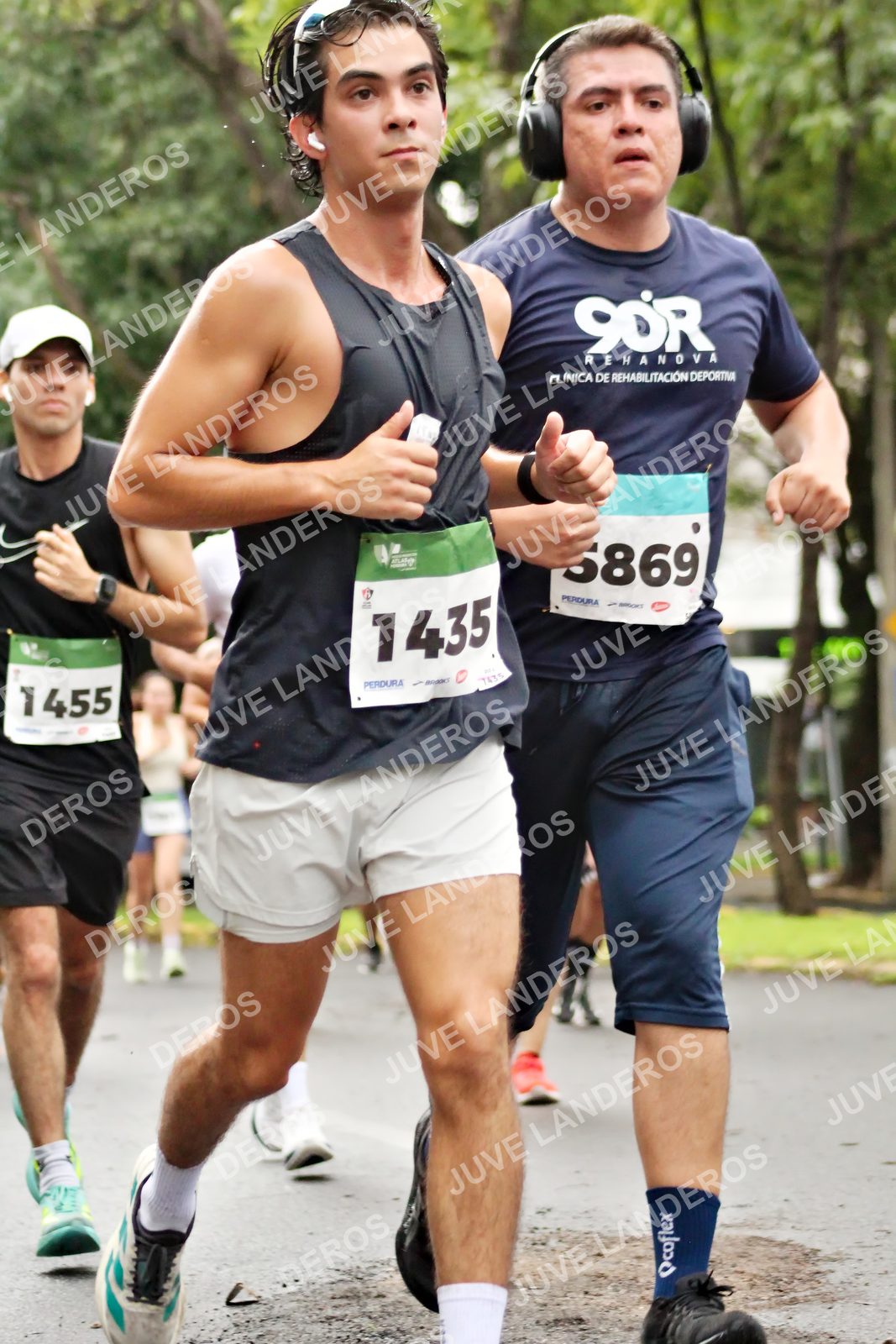 Foto del MEDIO MARATÓN ATLAS en Av. Patria, frente al Parque El Polvorín, Zapopan a las 08:24 · dorsal 1435, 1455, 5869