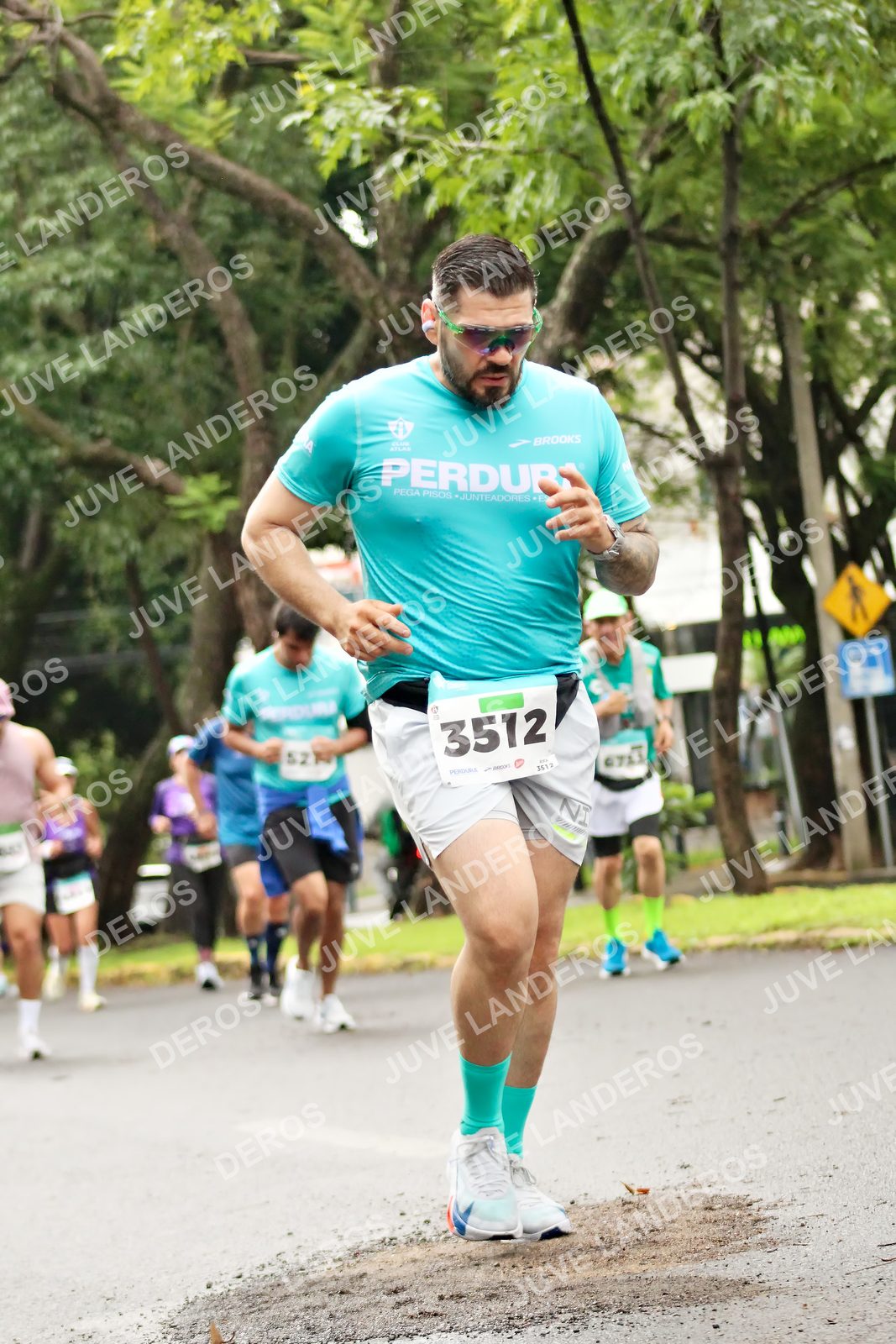 Foto del MEDIO MARATÓN ATLAS en Av. Patria, frente al Parque El Polvorín, Zapopan a las 08:37 · dorsal 3512, 52