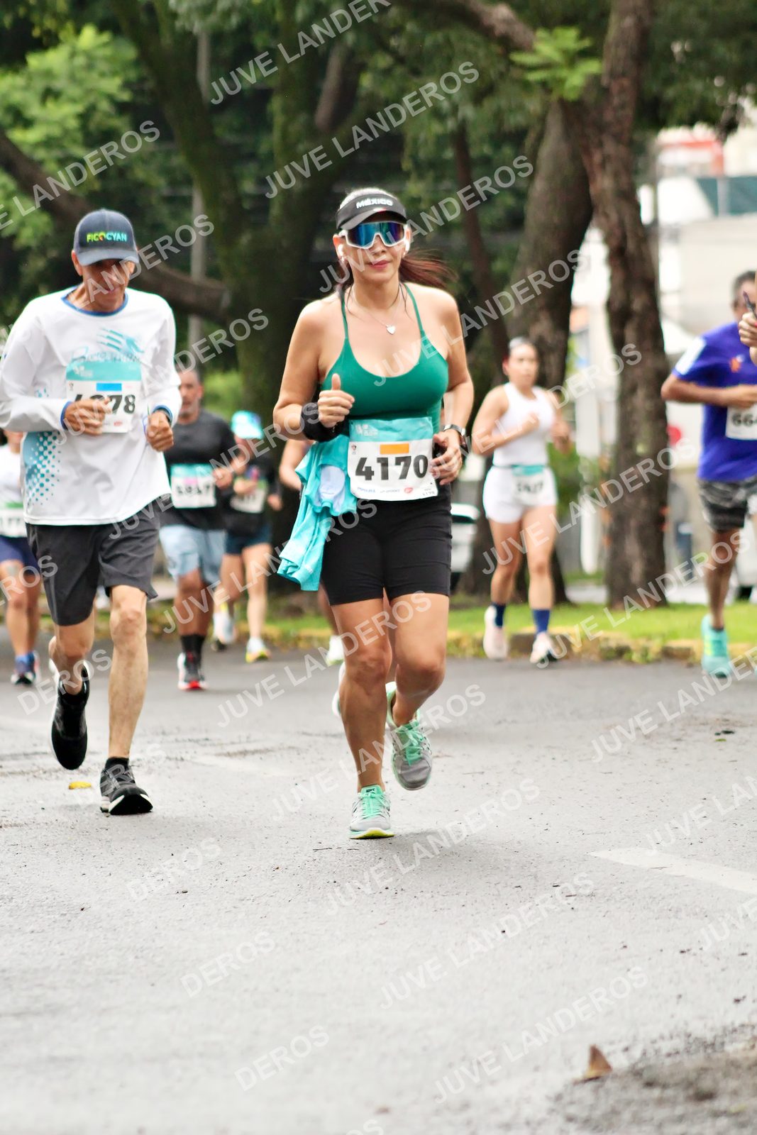 Foto del MEDIO MARATÓN ATLAS en Av. Patria, frente al Parque El Polvorín, Zapopan a las 08:29 · dorsal 4170, 78, 66