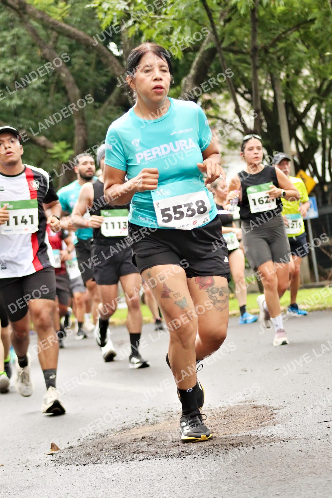 Foto del MEDIO MARATÓN ATLAS en Av. Patria, frente al Parque El Polvorín, Zapopan a las 08:31 · dorsal 5538, 162, 1113