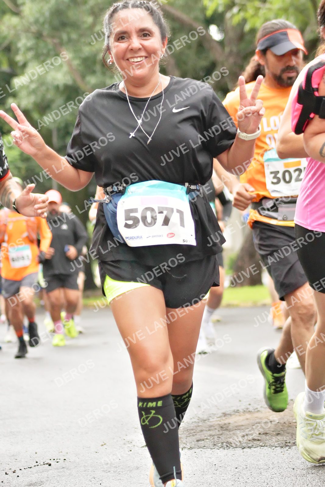 Foto del MEDIO MARATÓN ATLAS en Av. Patria, frente al Parque El Polvorín, Zapopan a las 08:36 · dorsal 5071, 302, 50