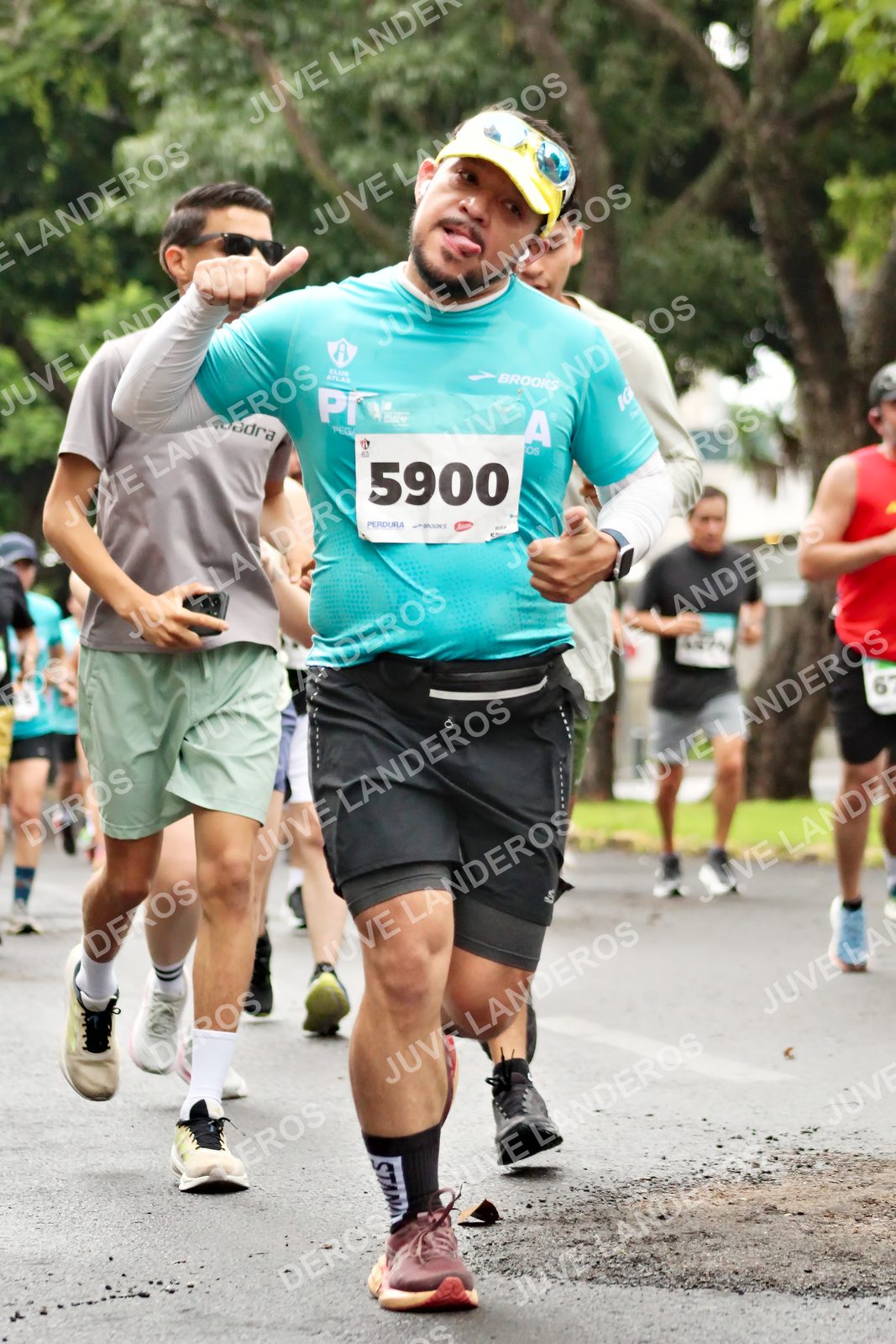 Foto del MEDIO MARATÓN ATLAS en Av. Patria, frente al Parque El Polvorín, Zapopan a las 08:24 · dorsal 5900