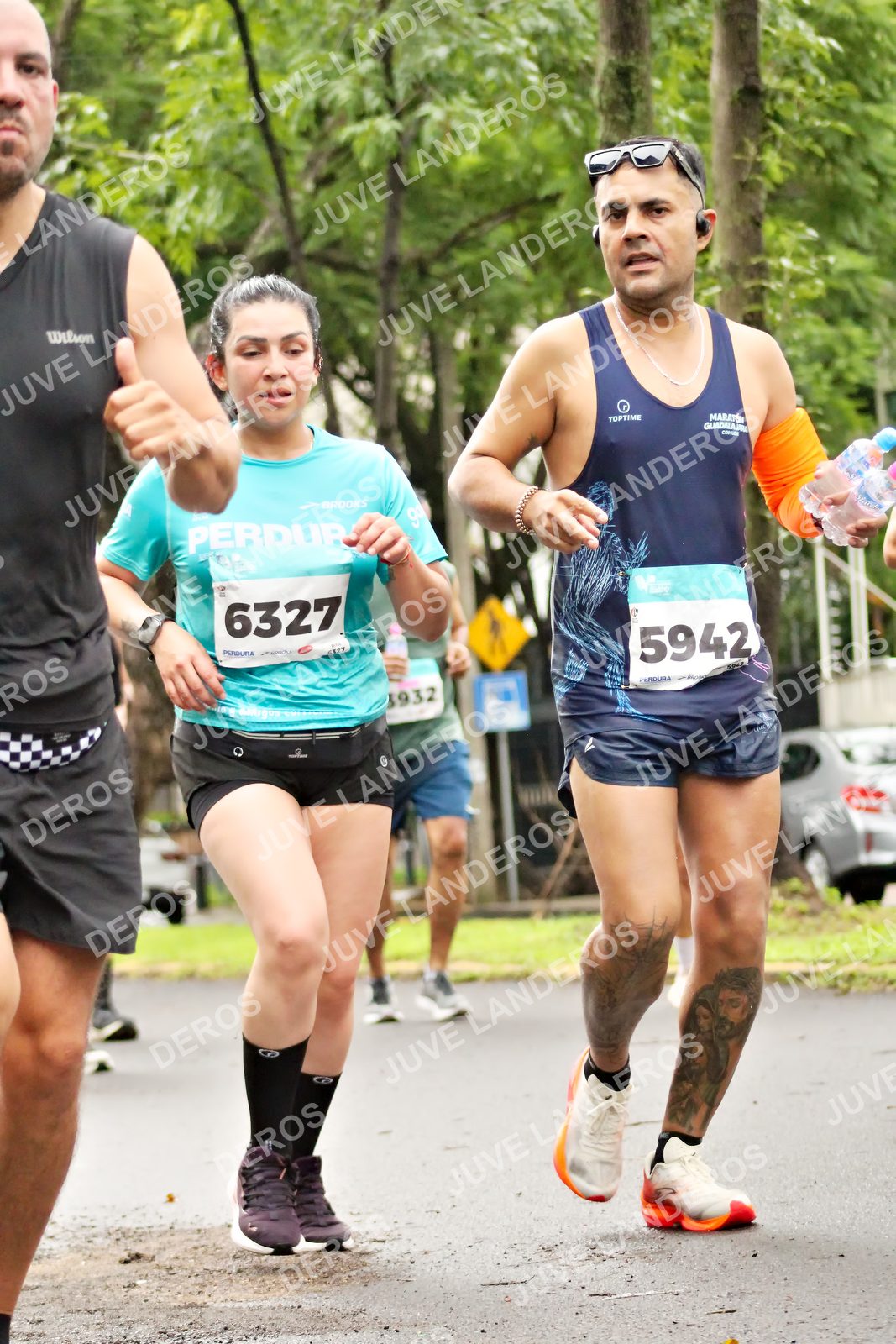 Foto del MEDIO MARATÓN ATLAS en Av. Patria, frente al Parque El Polvorín, Zapopan a las 08:30 · dorsal 6327, 5942, 1932