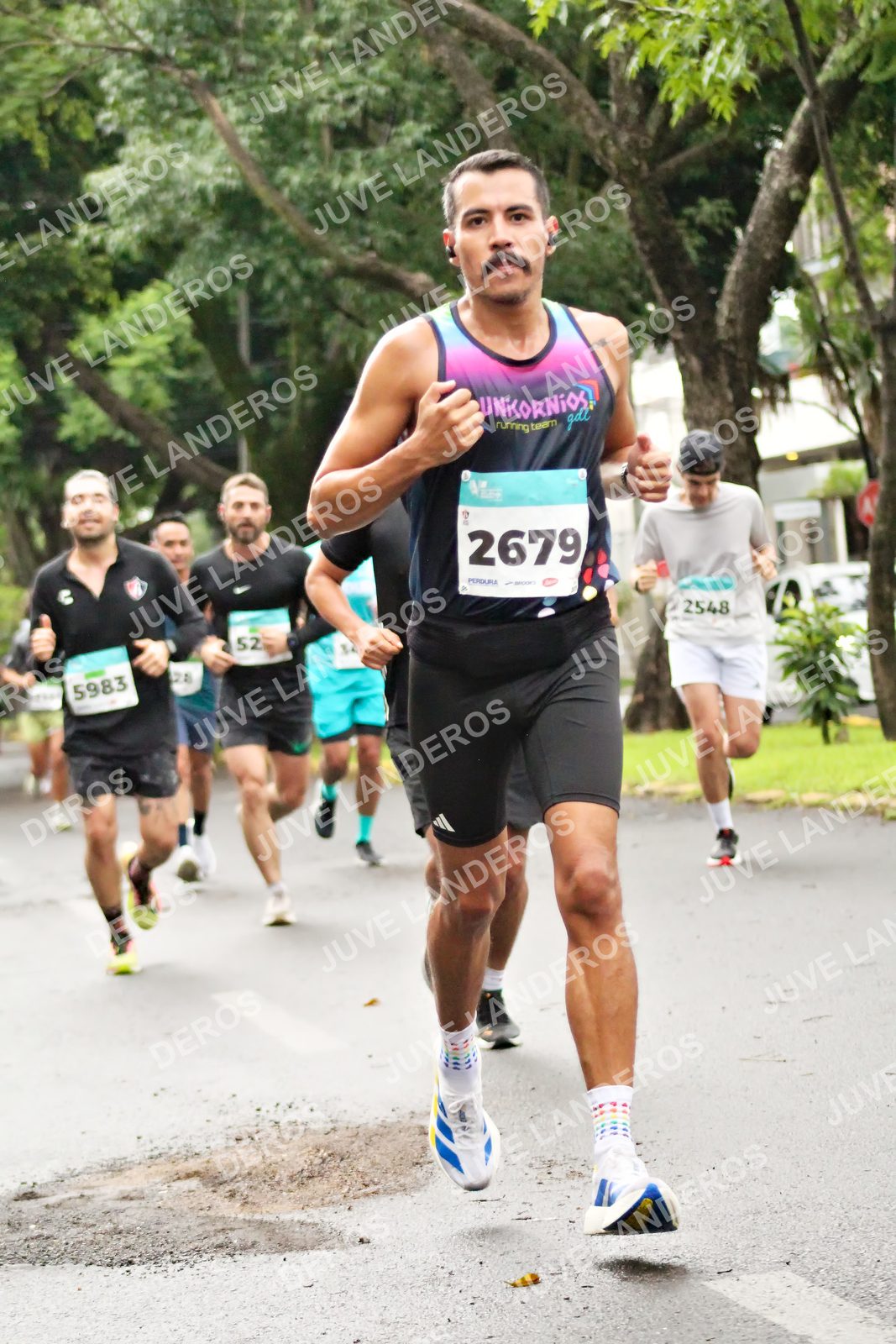 Foto del MEDIO MARATÓN ATLAS en Av. Patria, frente al Parque El Polvorín, Zapopan a las 08:13 · dorsal 2679, 52, 5983, 2548