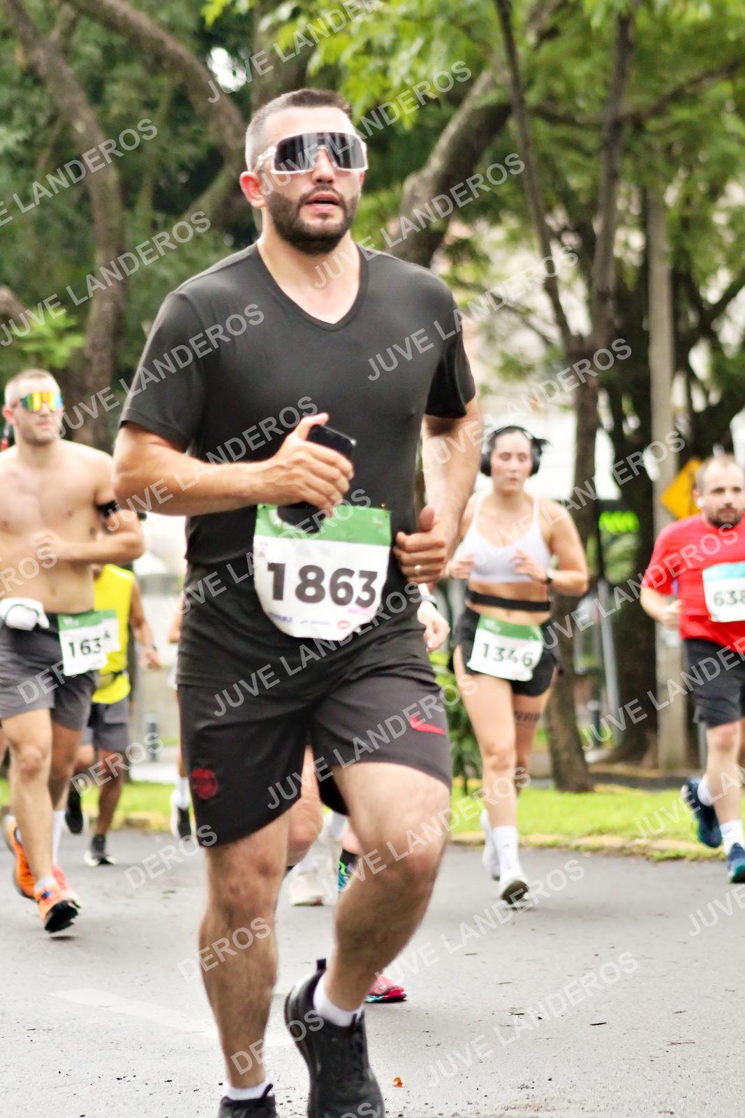 Foto del MEDIO MARATÓN ATLAS en Av. Patria, frente al Parque El Polvorín, Zapopan a las 08:28 · dorsal 1863, 163, 1346