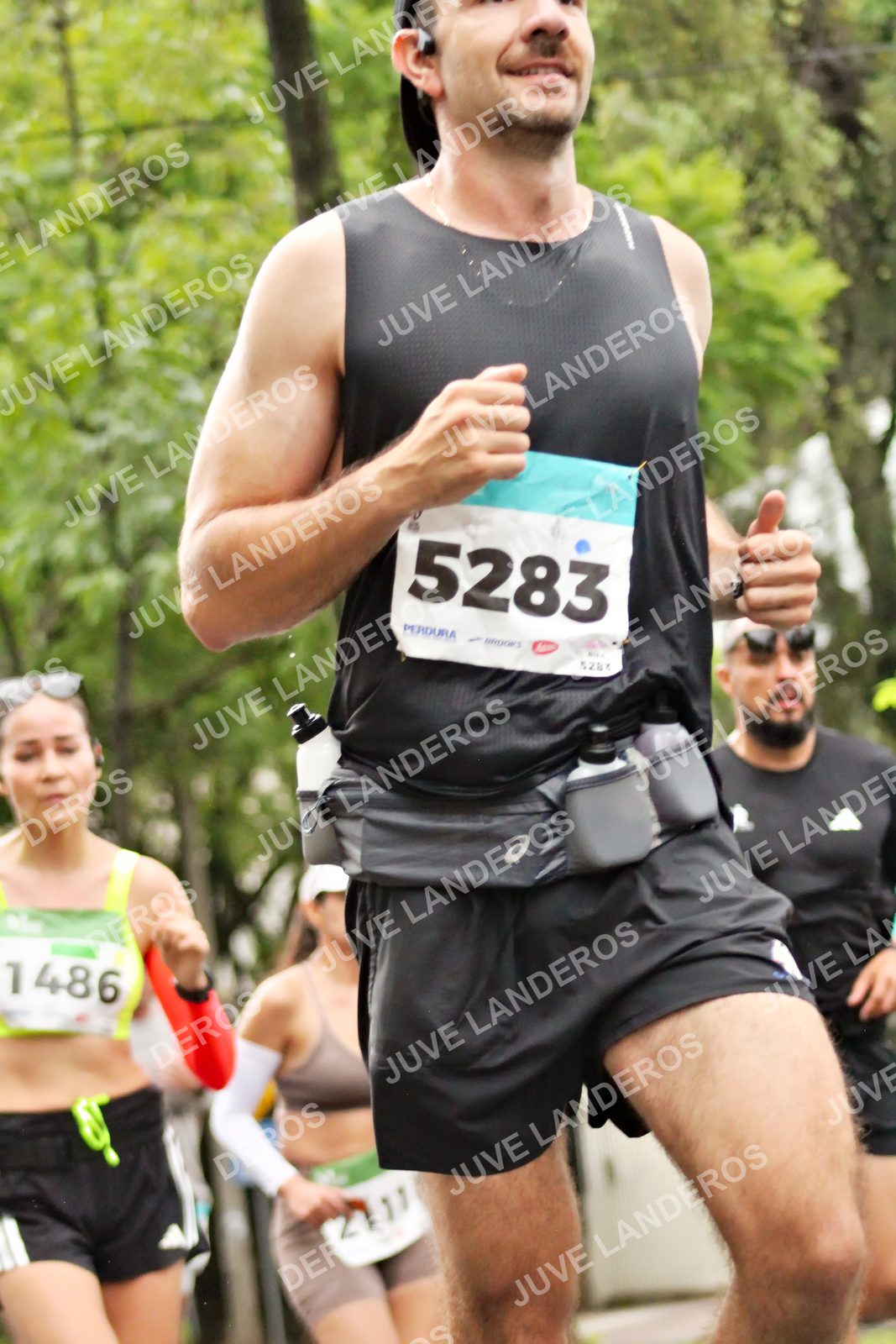 Foto del MEDIO MARATÓN ATLAS en Av. Patria, frente al Parque El Polvorín, Zapopan a las 08:22 · dorsal 5283, 1486, 1