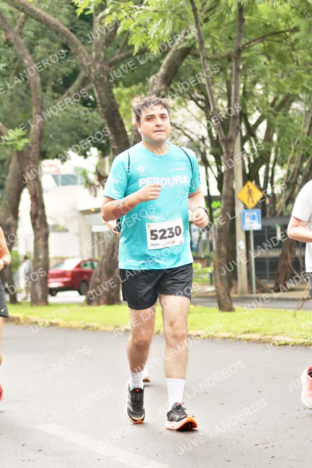 Foto del MEDIO MARATÓN ATLAS en Av. Patria, frente al Parque El Polvorín, Zapopan a las 08:53 · dorsal 5230
