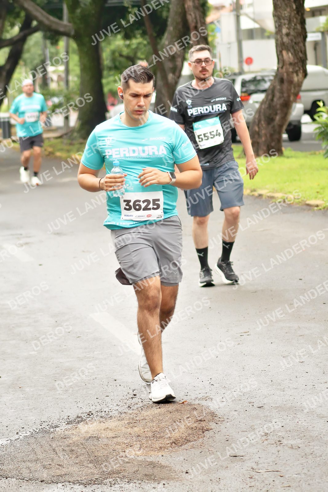 Foto del MEDIO MARATÓN ATLAS en Av. Patria, frente al Parque El Polvorín, Zapopan a las 09:04 · dorsal 3625, 5554