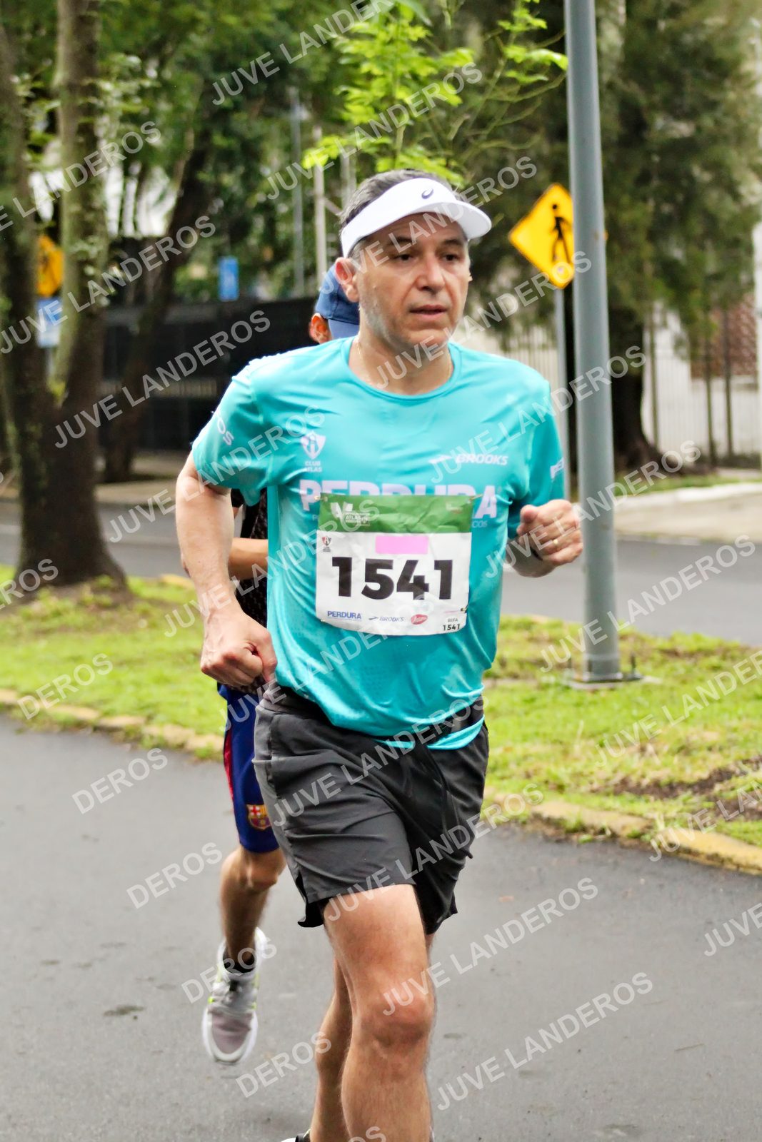 Foto del MEDIO MARATÓN ATLAS en Av. Patria, frente al Parque El Polvorín, Zapopan a las 08:12 · dorsal 1541