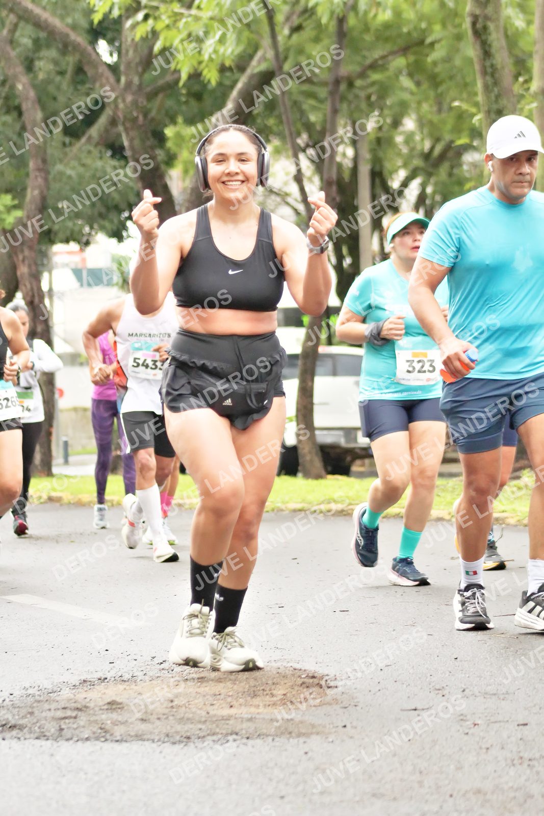 Foto del MEDIO MARATÓN ATLAS en Av. Patria, frente al Parque El Polvorín, Zapopan a las 08:44 · dorsal 323, 14