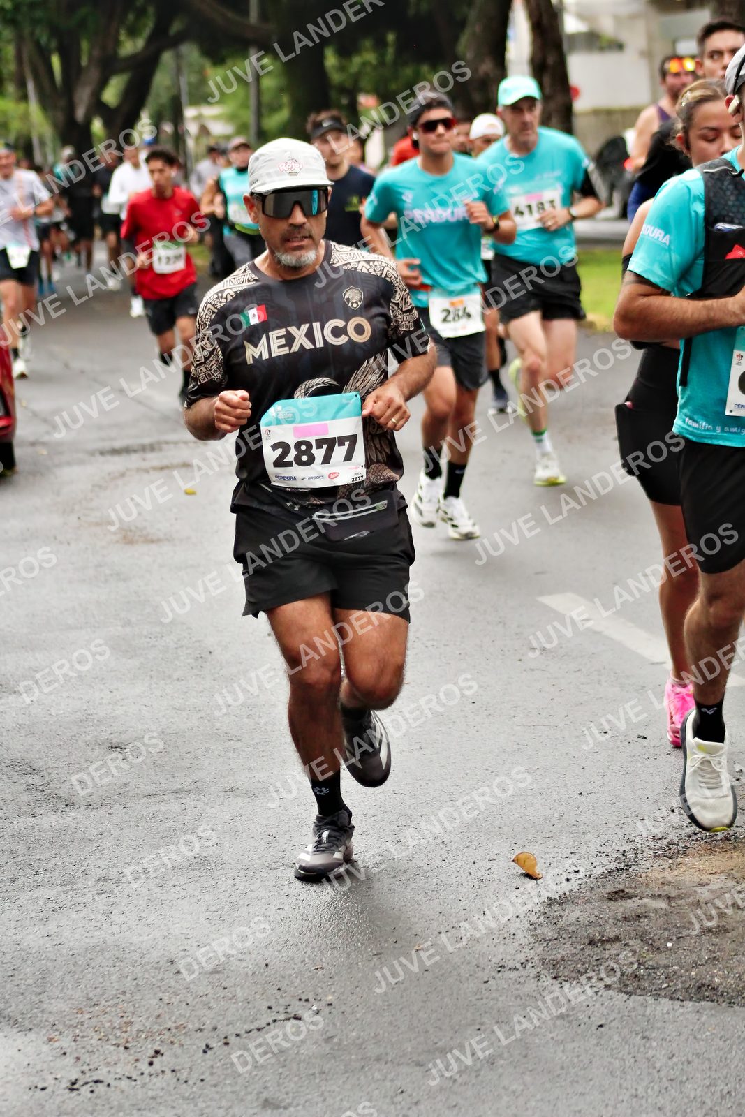 Foto del MEDIO MARATÓN ATLAS en Av. Patria, frente al Parque El Polvorín, Zapopan a las 08:20 · dorsal 2877, 284, 4183